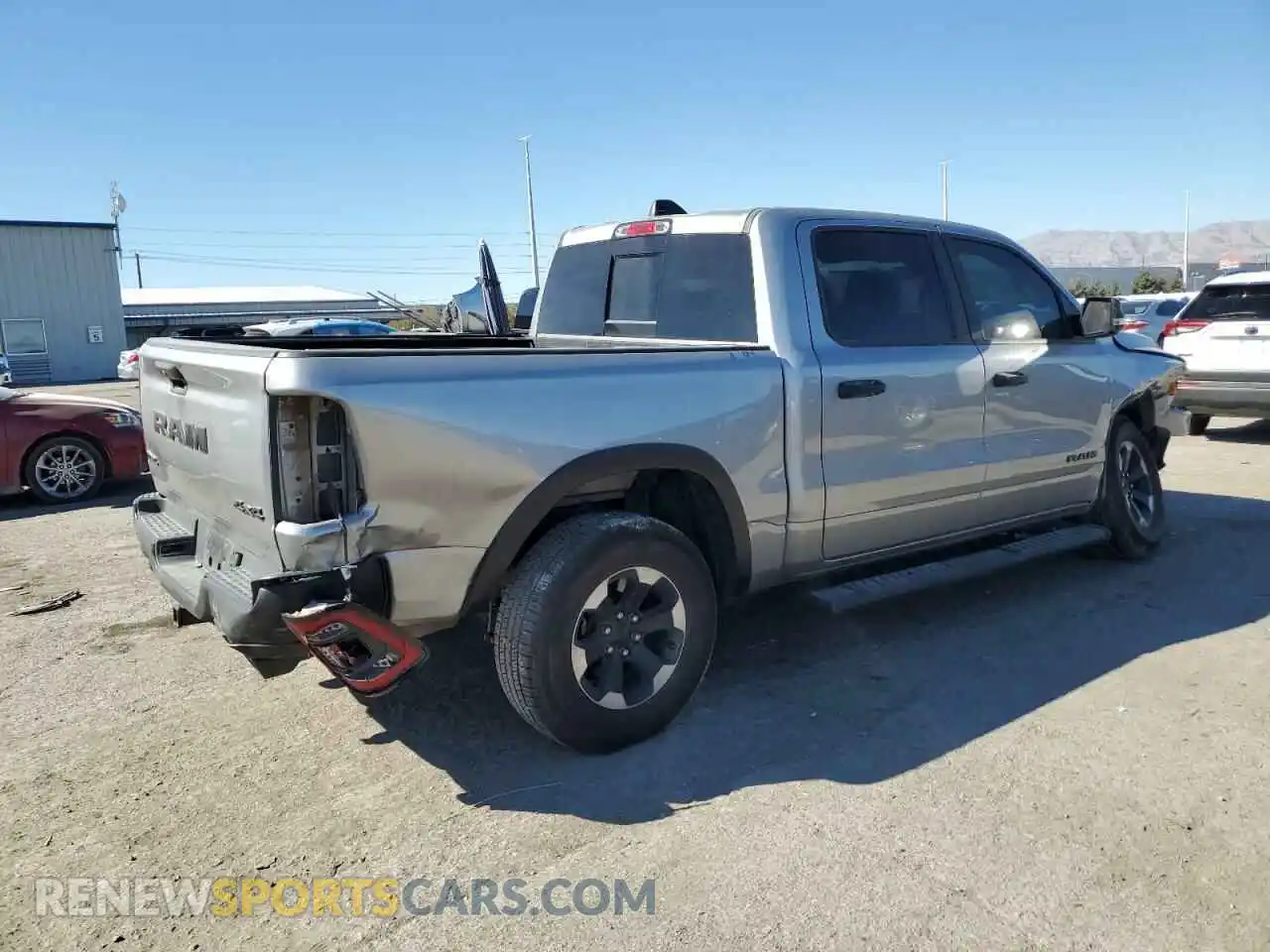 3 Photograph of a damaged car 1C6SRFLT6MN612677 RAM 1500 2021