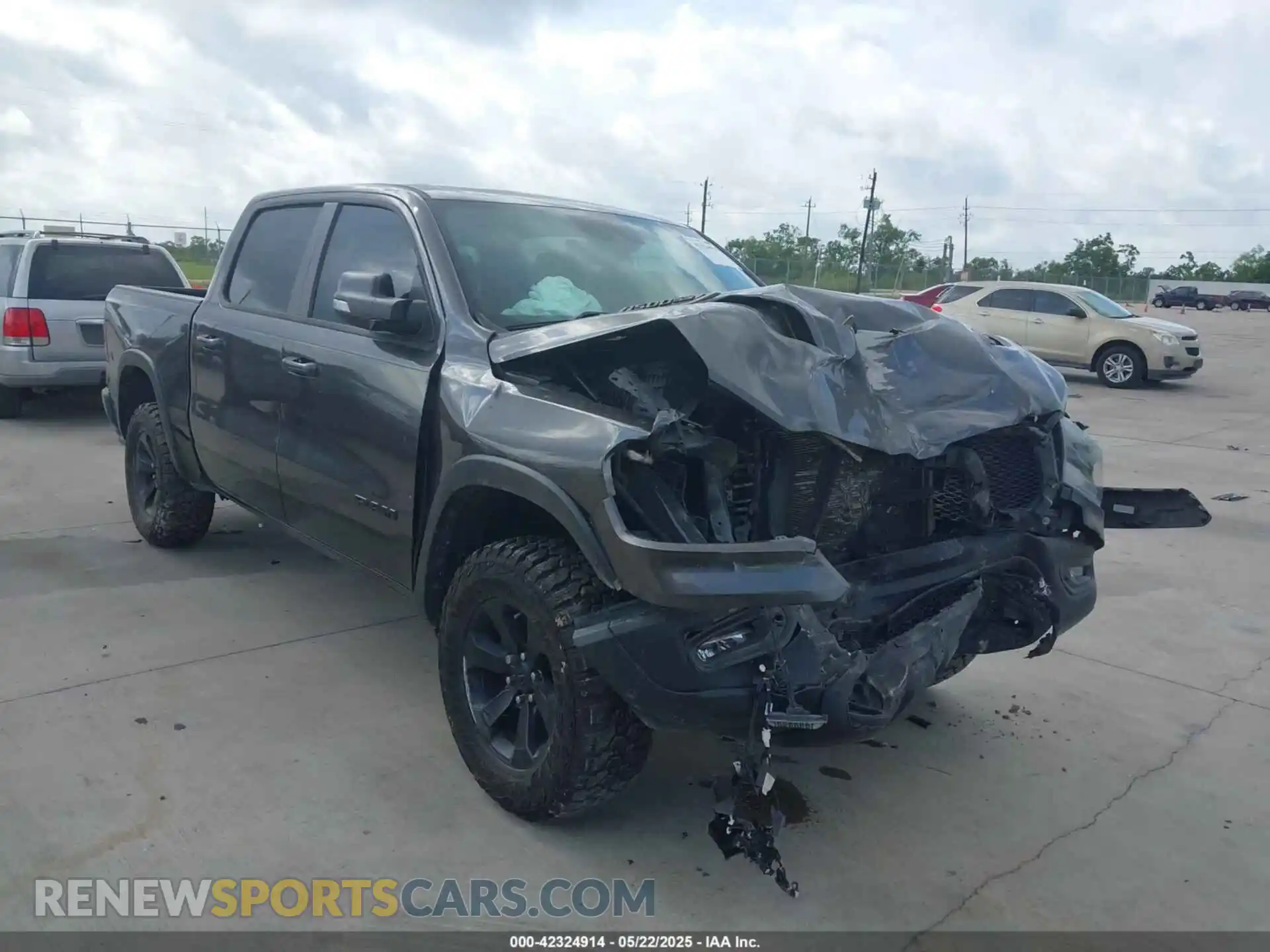 1 Photograph of a damaged car 1C6SRFLT7MN537312 RAM 1500 2021