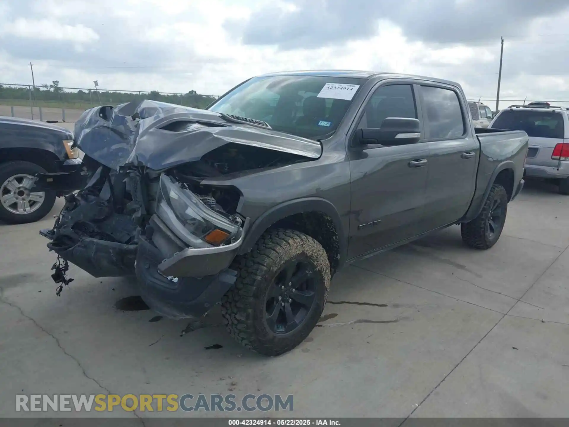 2 Photograph of a damaged car 1C6SRFLT7MN537312 RAM 1500 2021