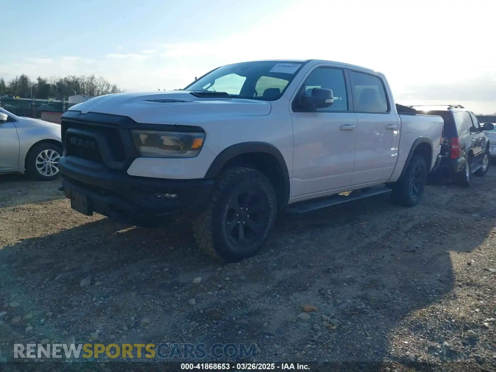 2 Photograph of a damaged car 1C6SRFLT7MN646031 RAM 1500 2021