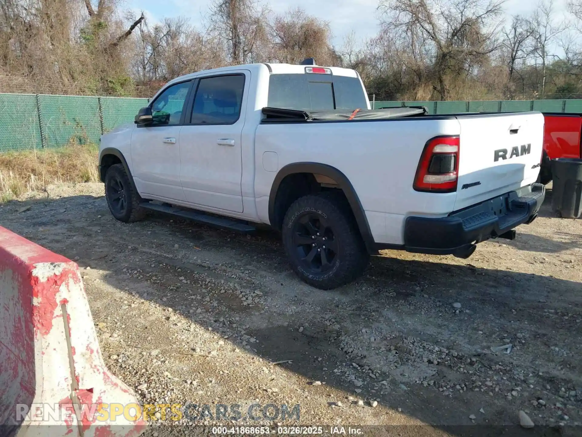 3 Photograph of a damaged car 1C6SRFLT7MN646031 RAM 1500 2021
