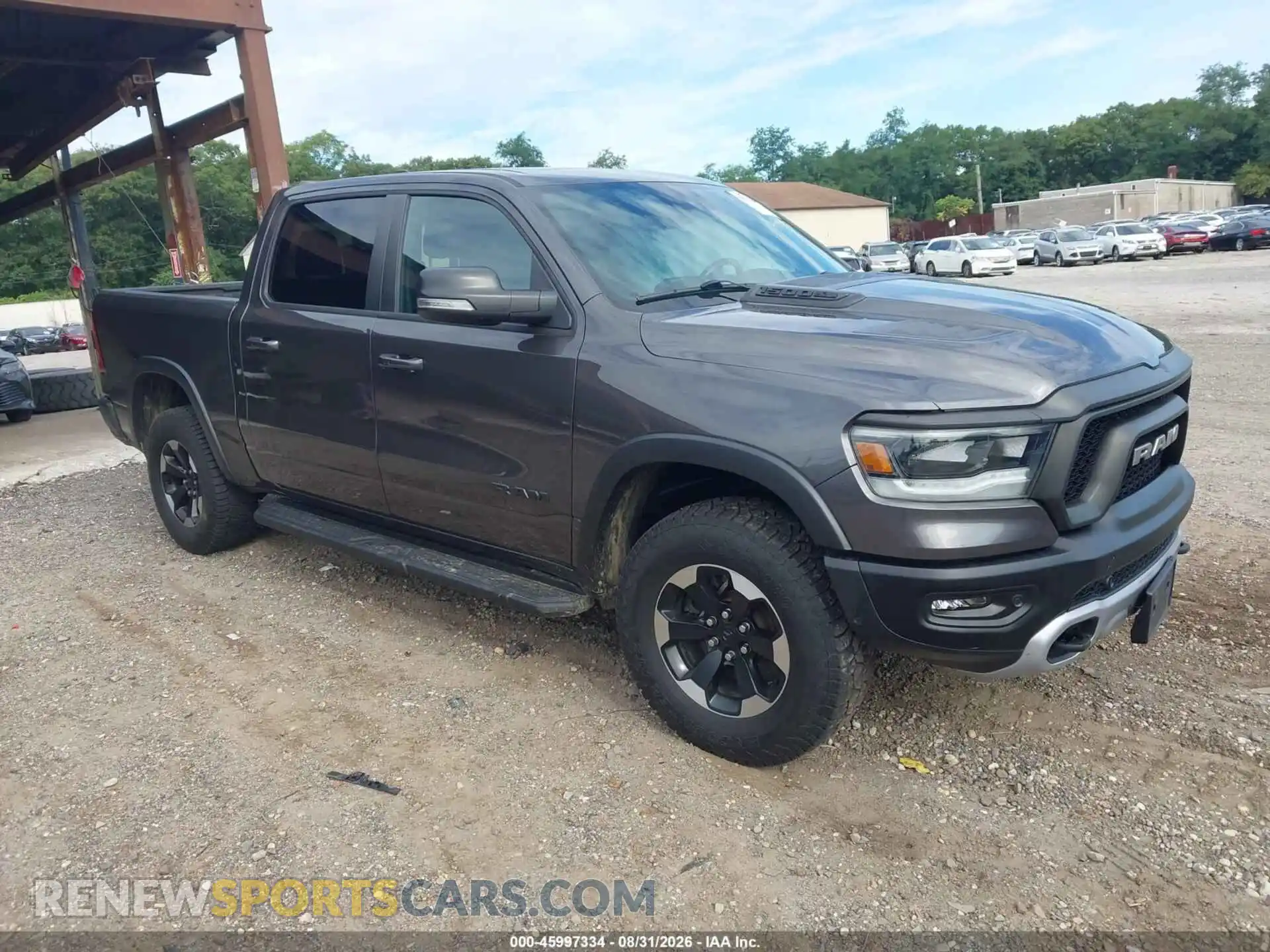 1 Photograph of a damaged car 1C6SRFLT8MN559304 RAM 1500 2021