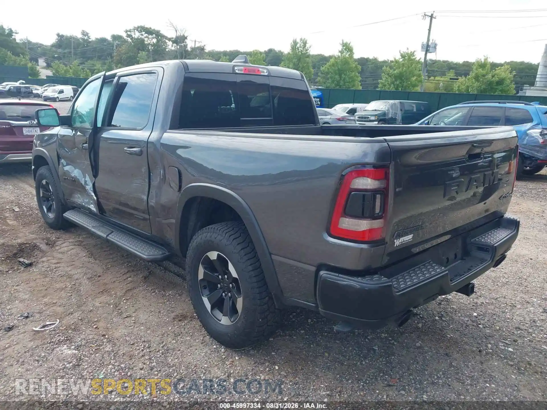 3 Photograph of a damaged car 1C6SRFLT8MN559304 RAM 1500 2021