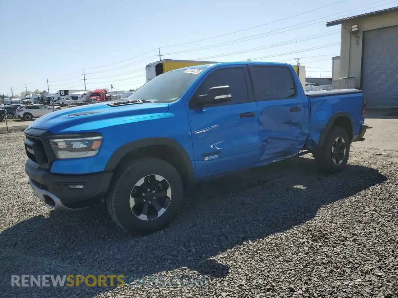 1 Photograph of a damaged car 1C6SRFLT8MN598457 RAM 1500 2021