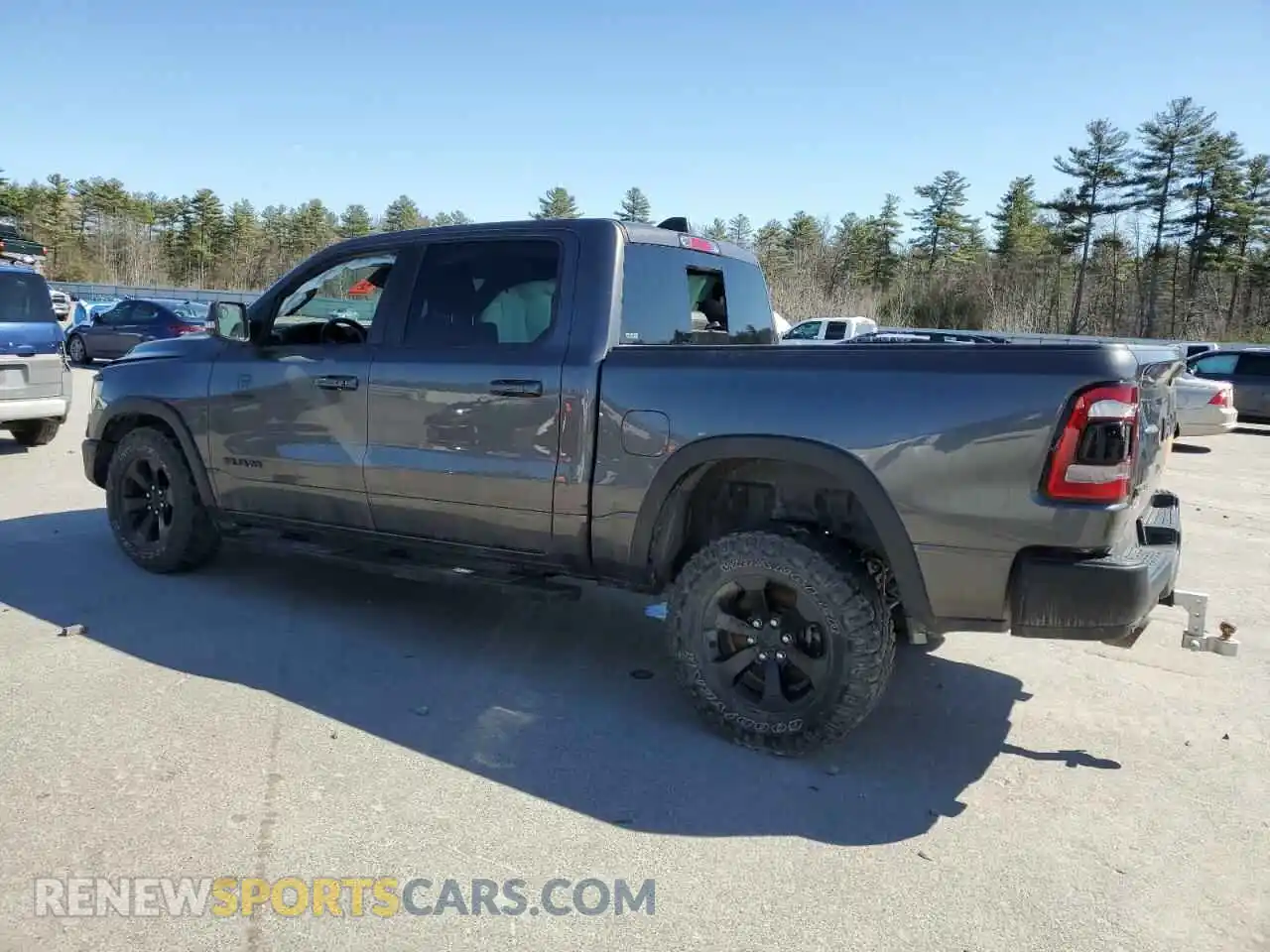 2 Photograph of a damaged car 1C6SRFLTXMN646198 RAM 1500 2021