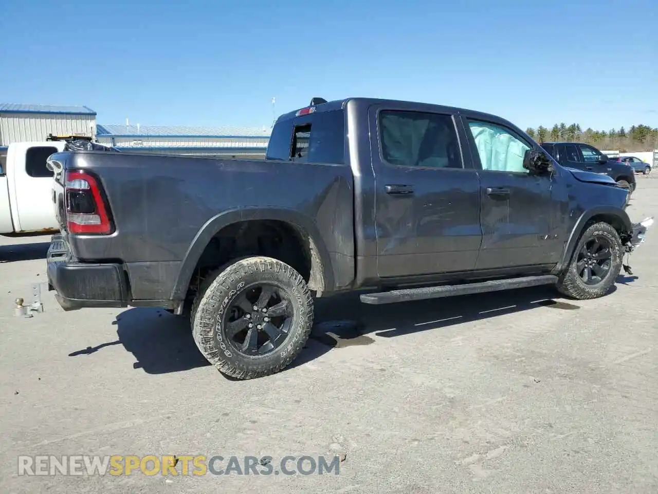 3 Photograph of a damaged car 1C6SRFLTXMN646198 RAM 1500 2021