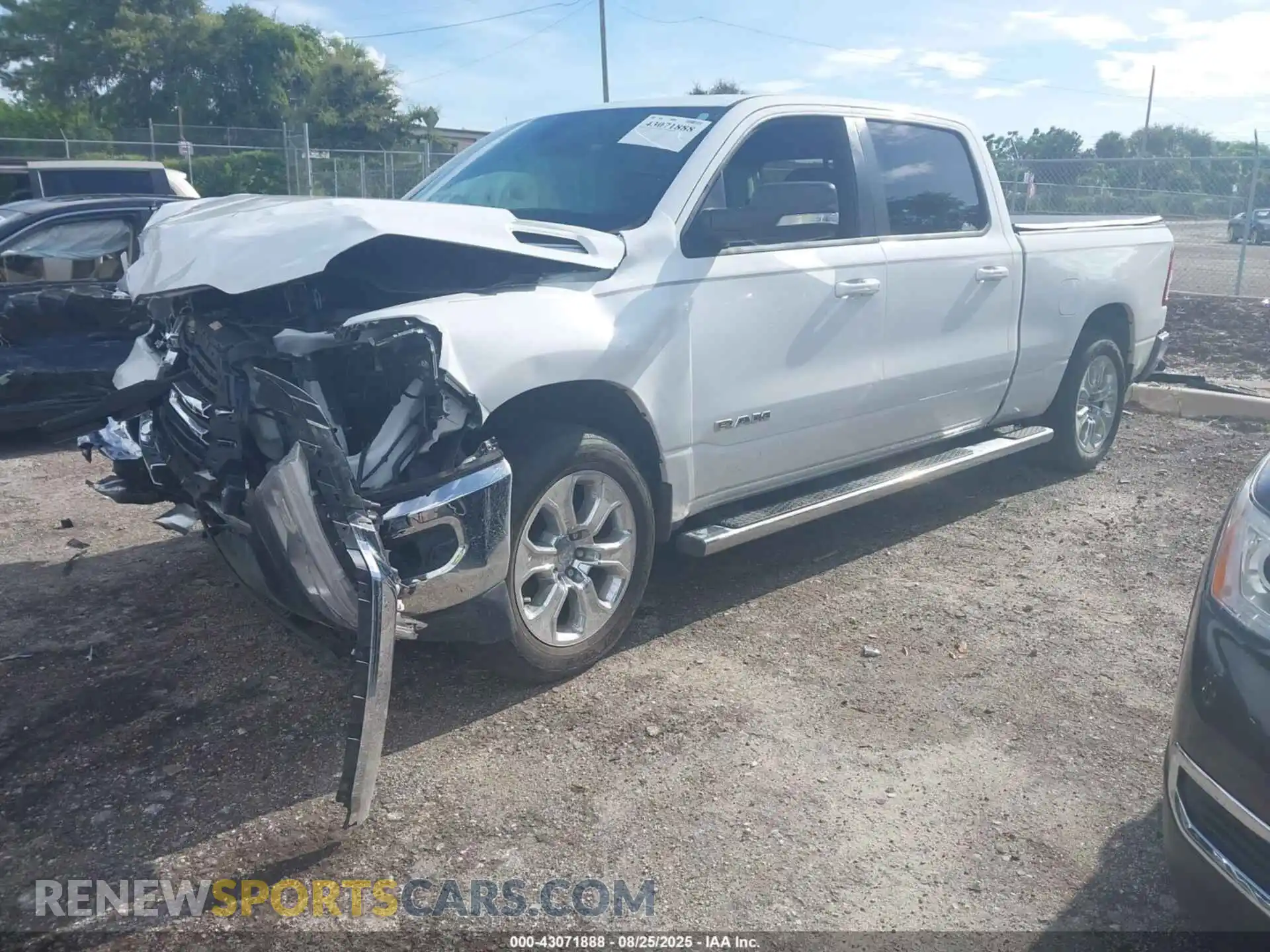 2 Photograph of a damaged car 1C6SRFMT0MN635449 RAM 1500 2021