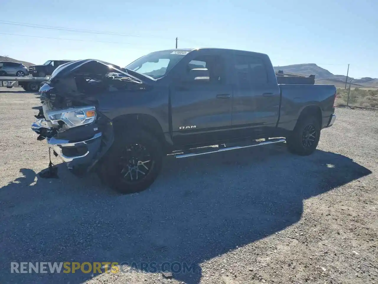 1 Photograph of a damaged car 1C6SRFMT0MN667835 RAM 1500 2021