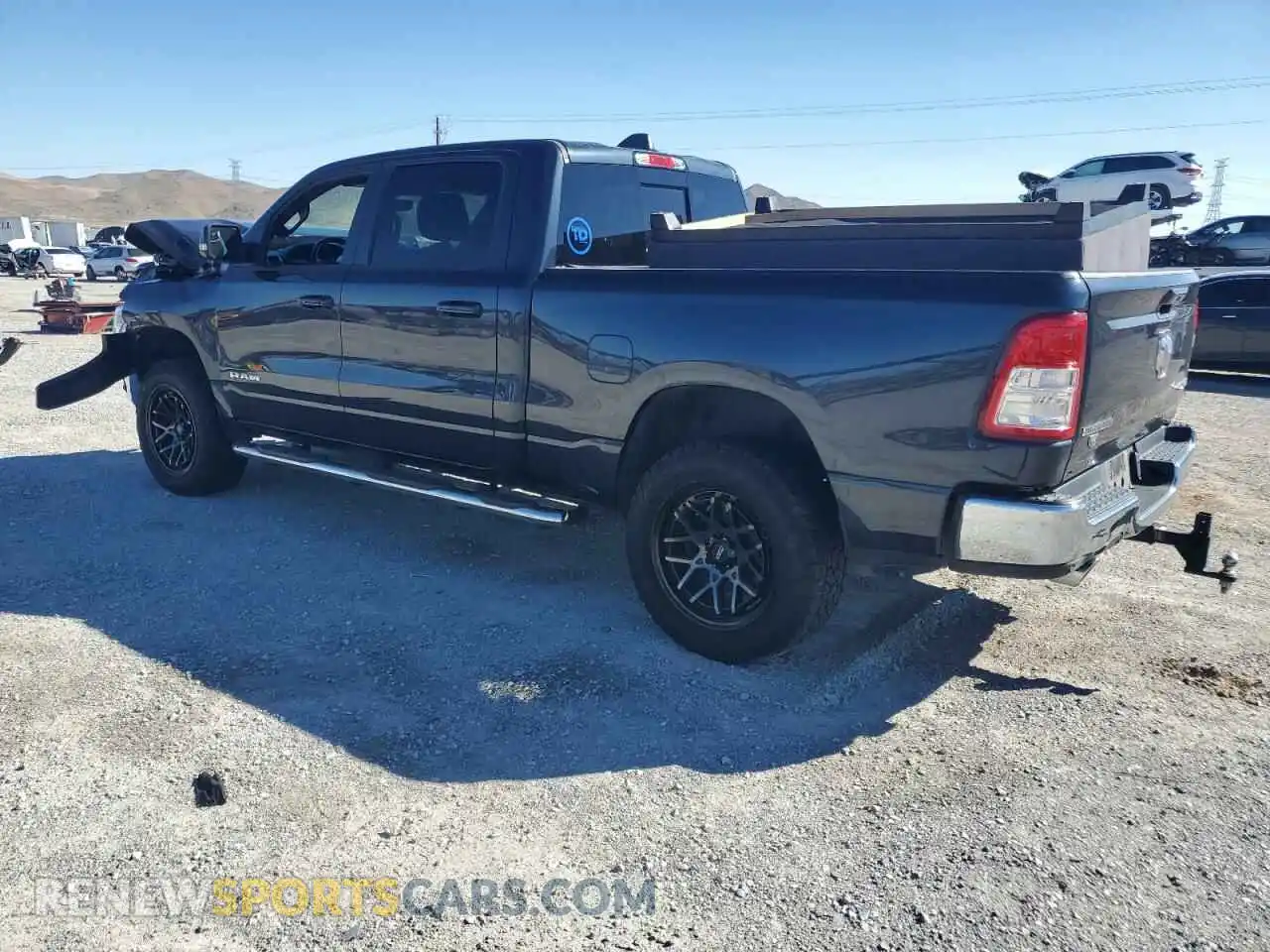 2 Photograph of a damaged car 1C6SRFMT0MN667835 RAM 1500 2021