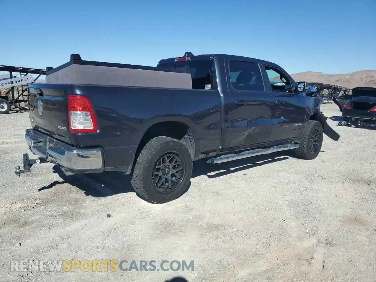 3 Photograph of a damaged car 1C6SRFMT0MN667835 RAM 1500 2021