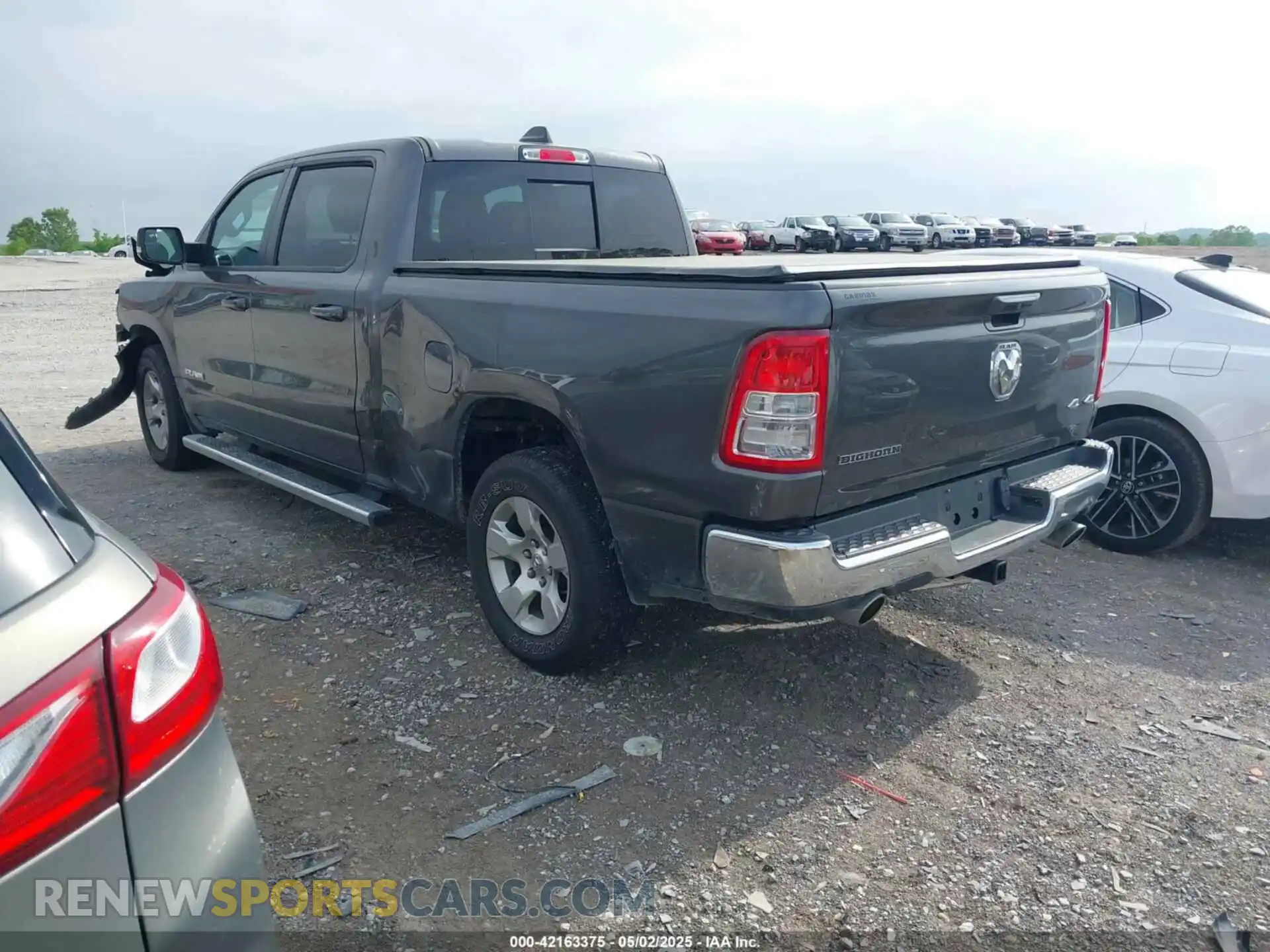 3 Photograph of a damaged car 1C6SRFMT0MN672355 RAM 1500 2021