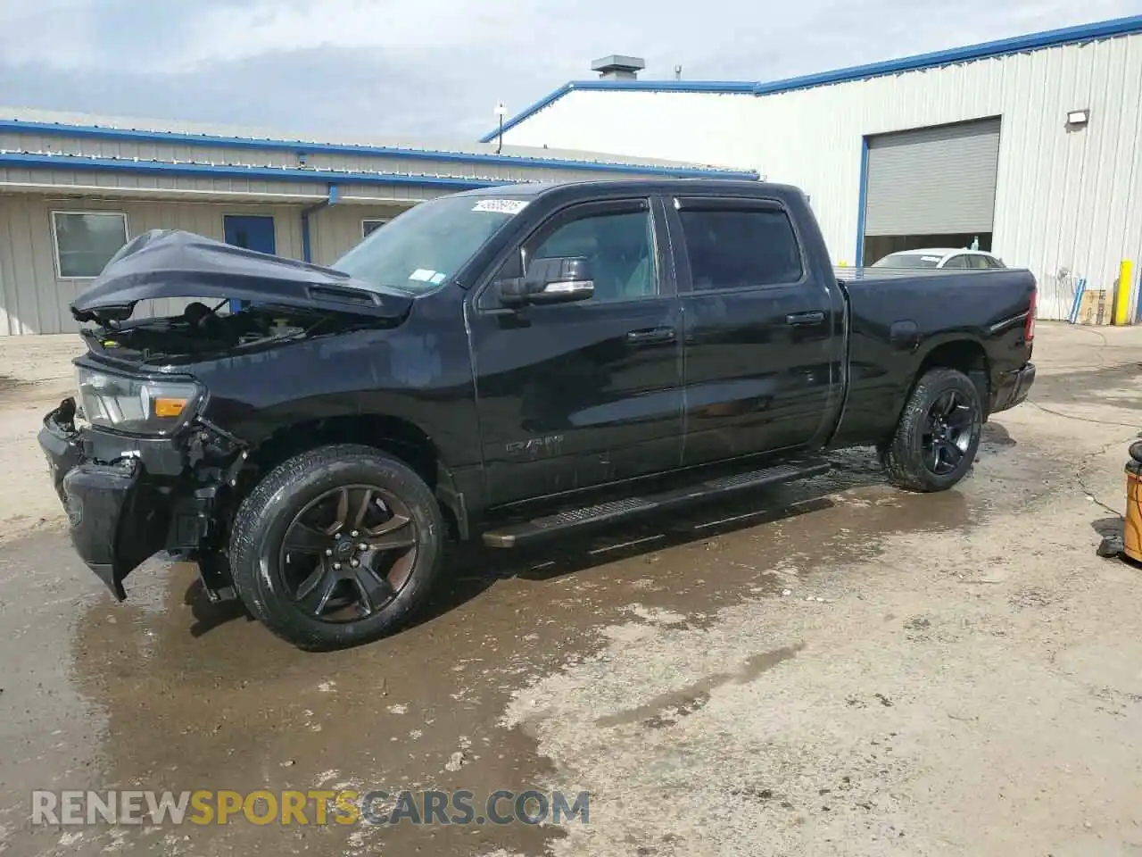 1 Photograph of a damaged car 1C6SRFMT4MN602776 RAM 1500 2021