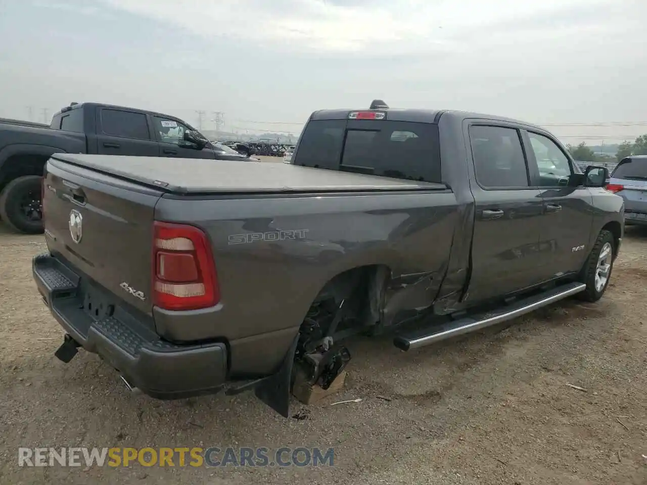 3 Photograph of a damaged car 1C6SRFMT4MN620954 RAM 1500 2021