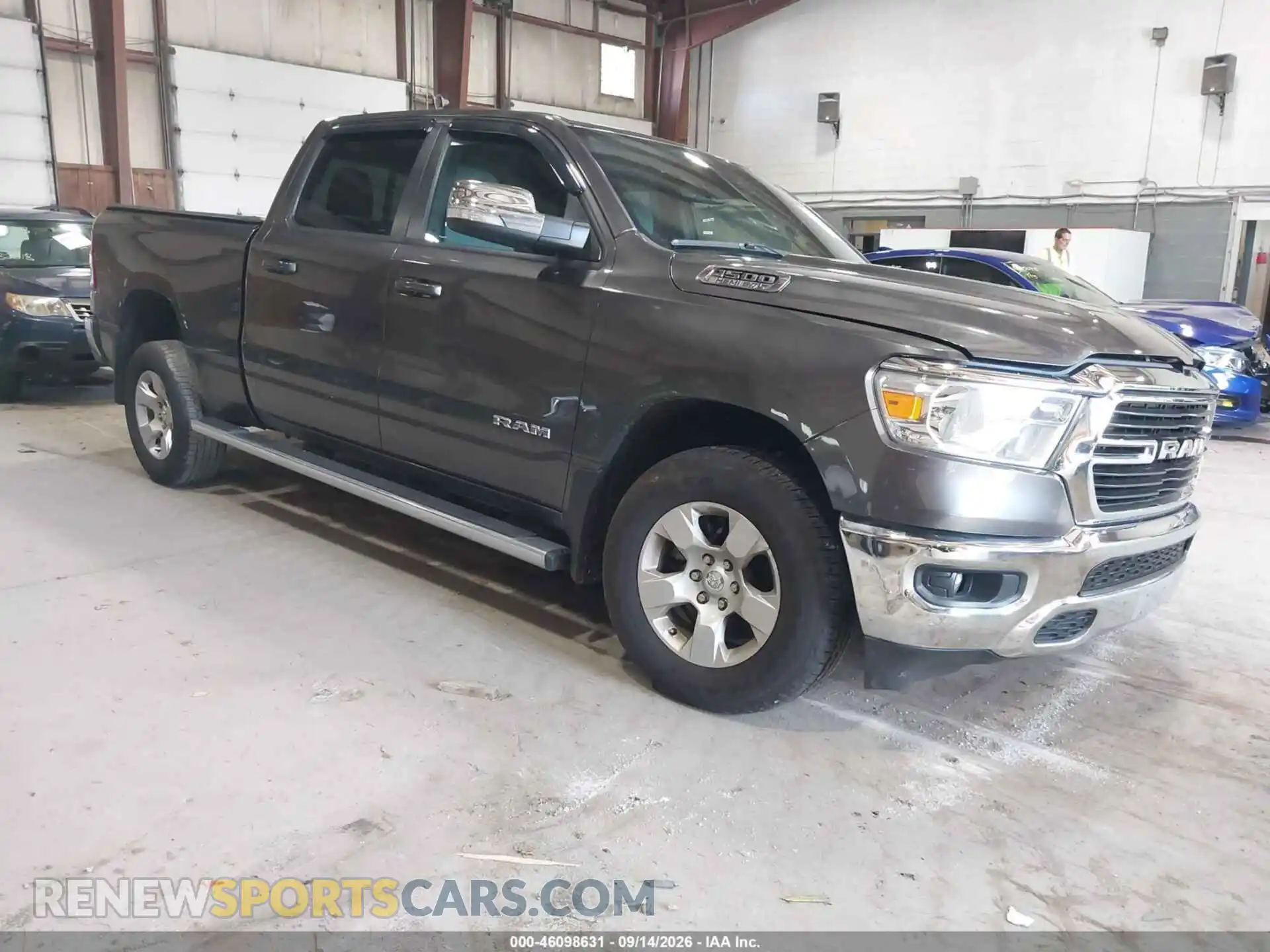 1 Photograph of a damaged car 1C6SRFMT6MN552978 RAM 1500 2021