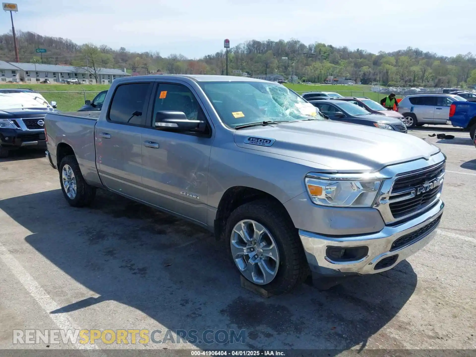 1 Photograph of a damaged car 1C6SRFMT9MN613806 RAM 1500 2021