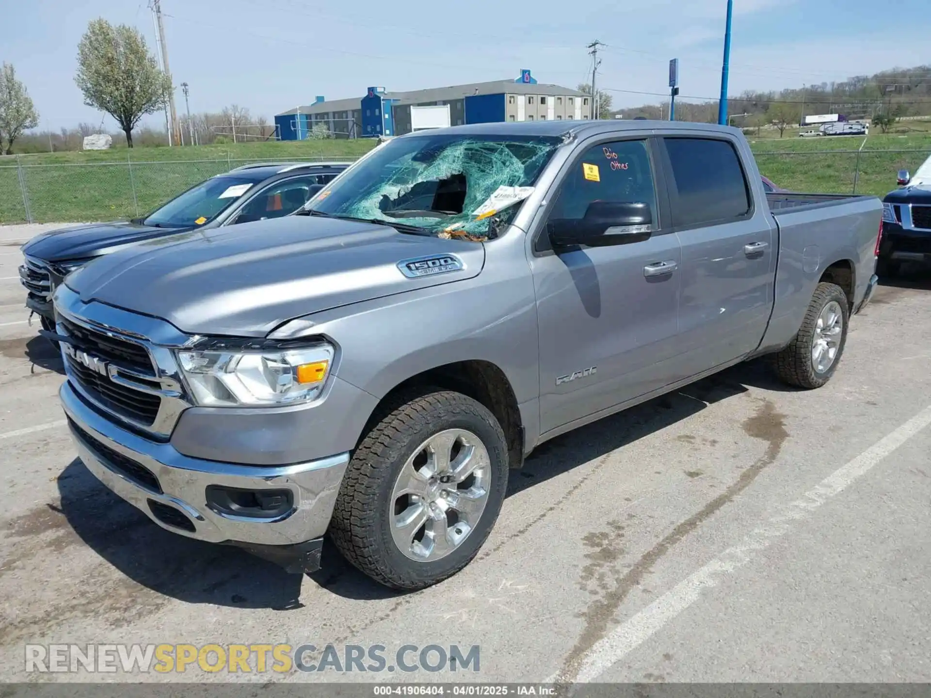 2 Photograph of a damaged car 1C6SRFMT9MN613806 RAM 1500 2021