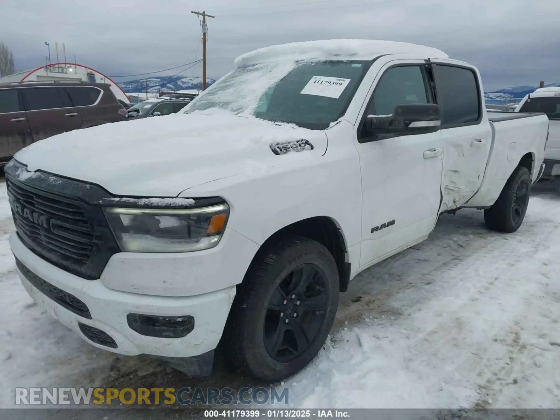2 Photograph of a damaged car 1C6SRFMTXMN547203 RAM 1500 2021