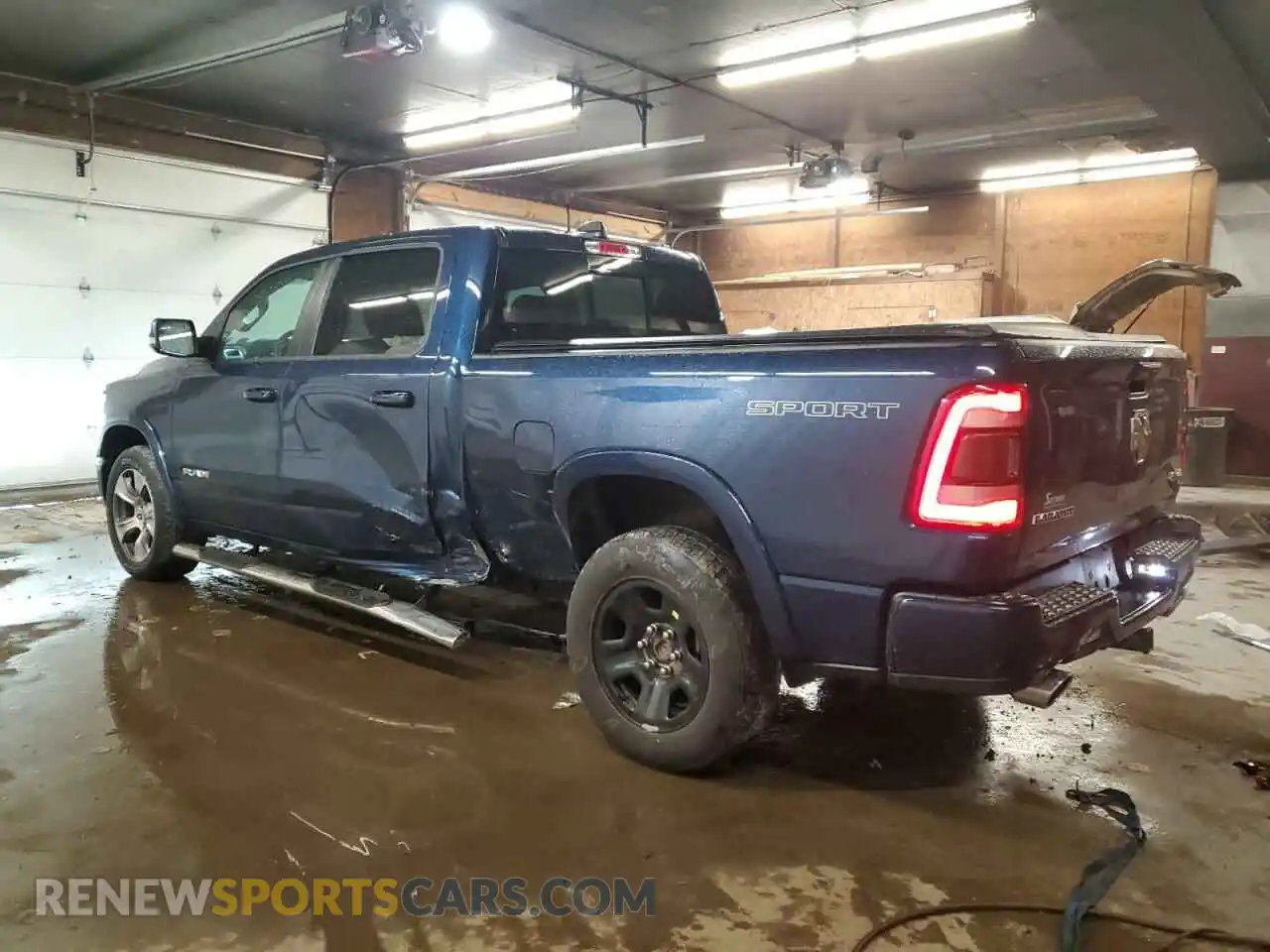 2 Photograph of a damaged car 1C6SRFRT2MN699534 RAM 1500 2021