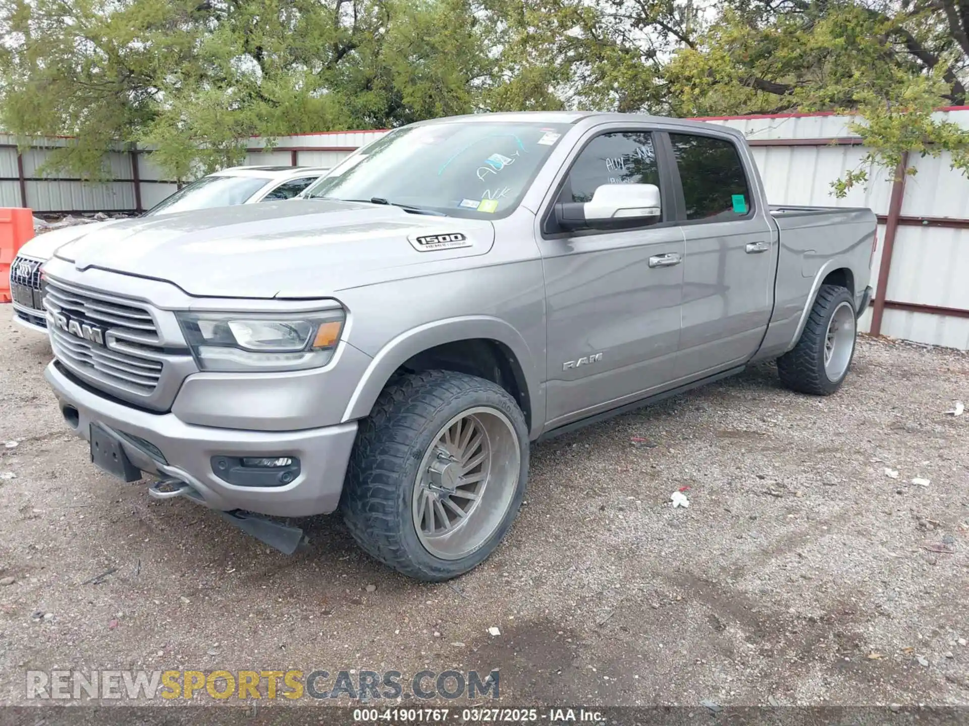 2 Photograph of a damaged car 1C6SRFRT3MN831765 RAM 1500 2021