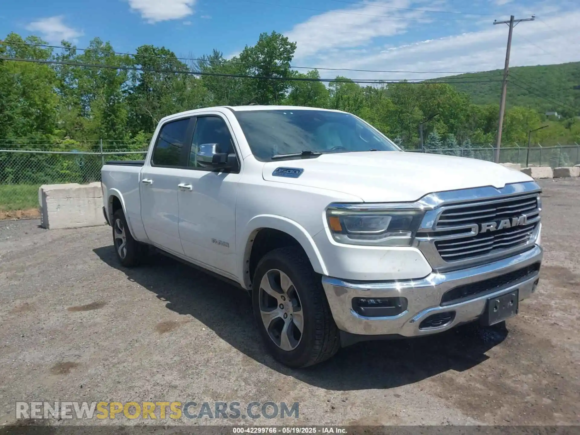 1 Photograph of a damaged car 1C6SRFRTXMN682089 RAM 1500 2021