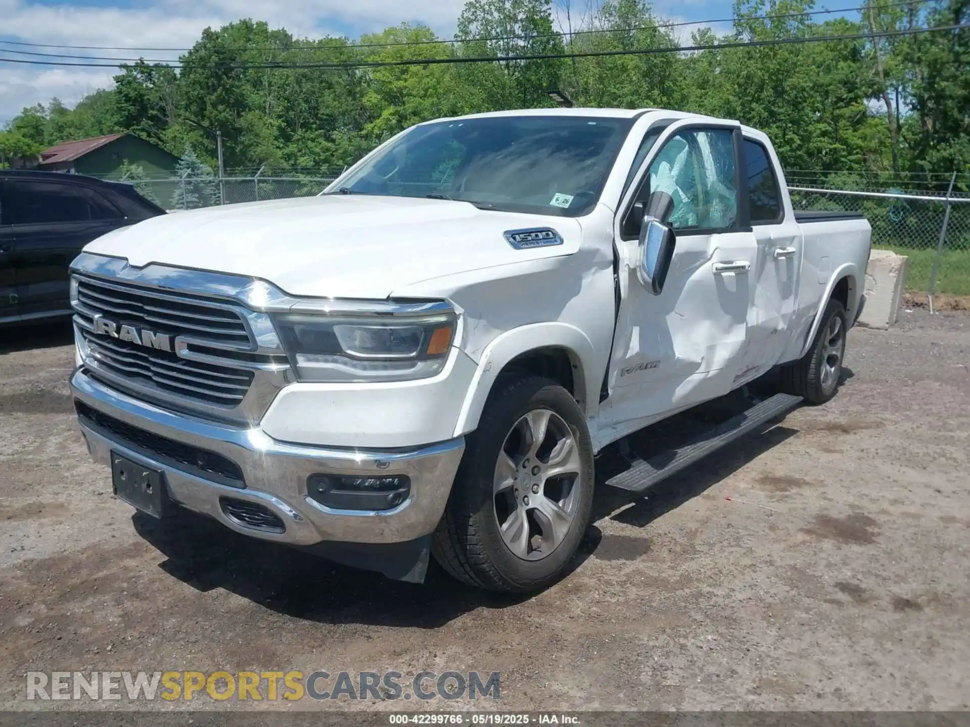 2 Photograph of a damaged car 1C6SRFRTXMN682089 RAM 1500 2021