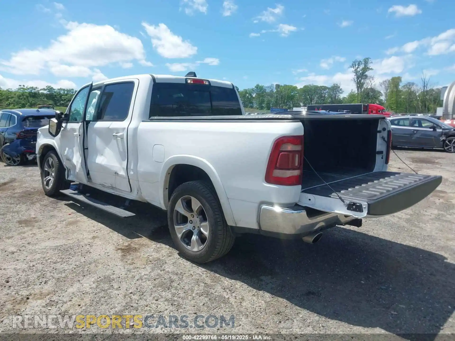 3 Photograph of a damaged car 1C6SRFRTXMN682089 RAM 1500 2021