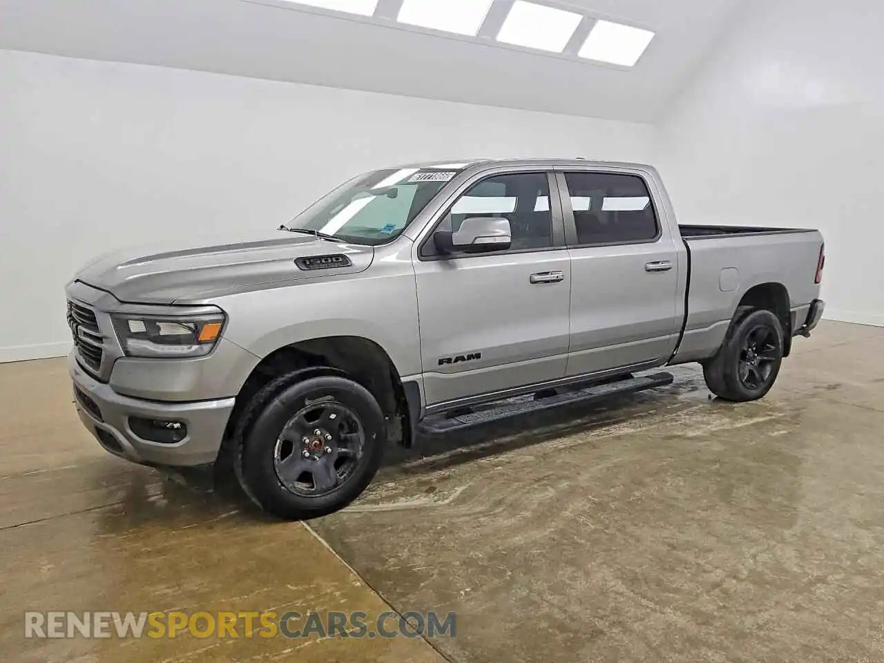 1 Photograph of a damaged car 1C6SRFTT1MN515502 RAM 1500 2021