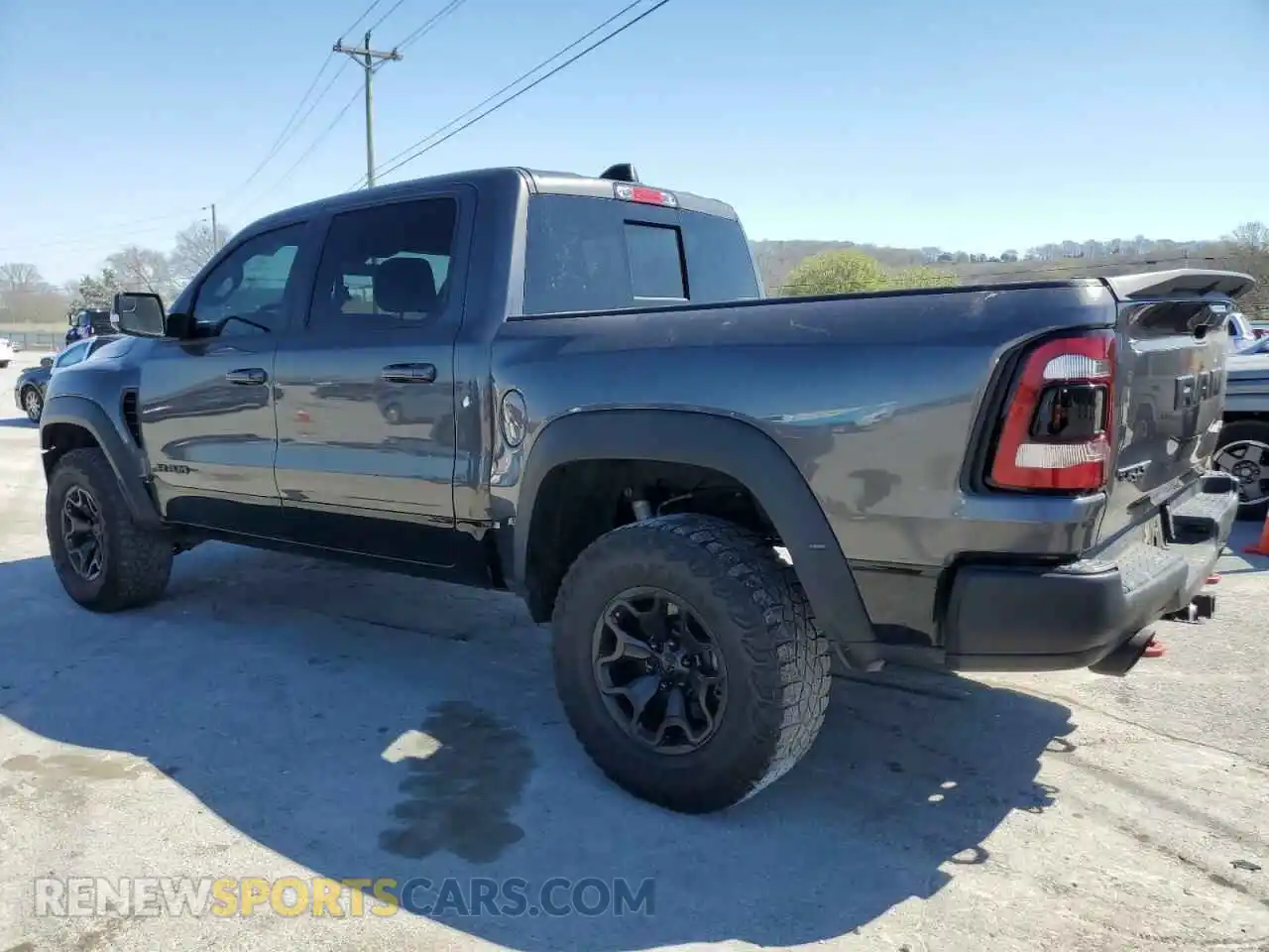 2 Photograph of a damaged car 1C6SRFU90MN832366 RAM 1500 2021