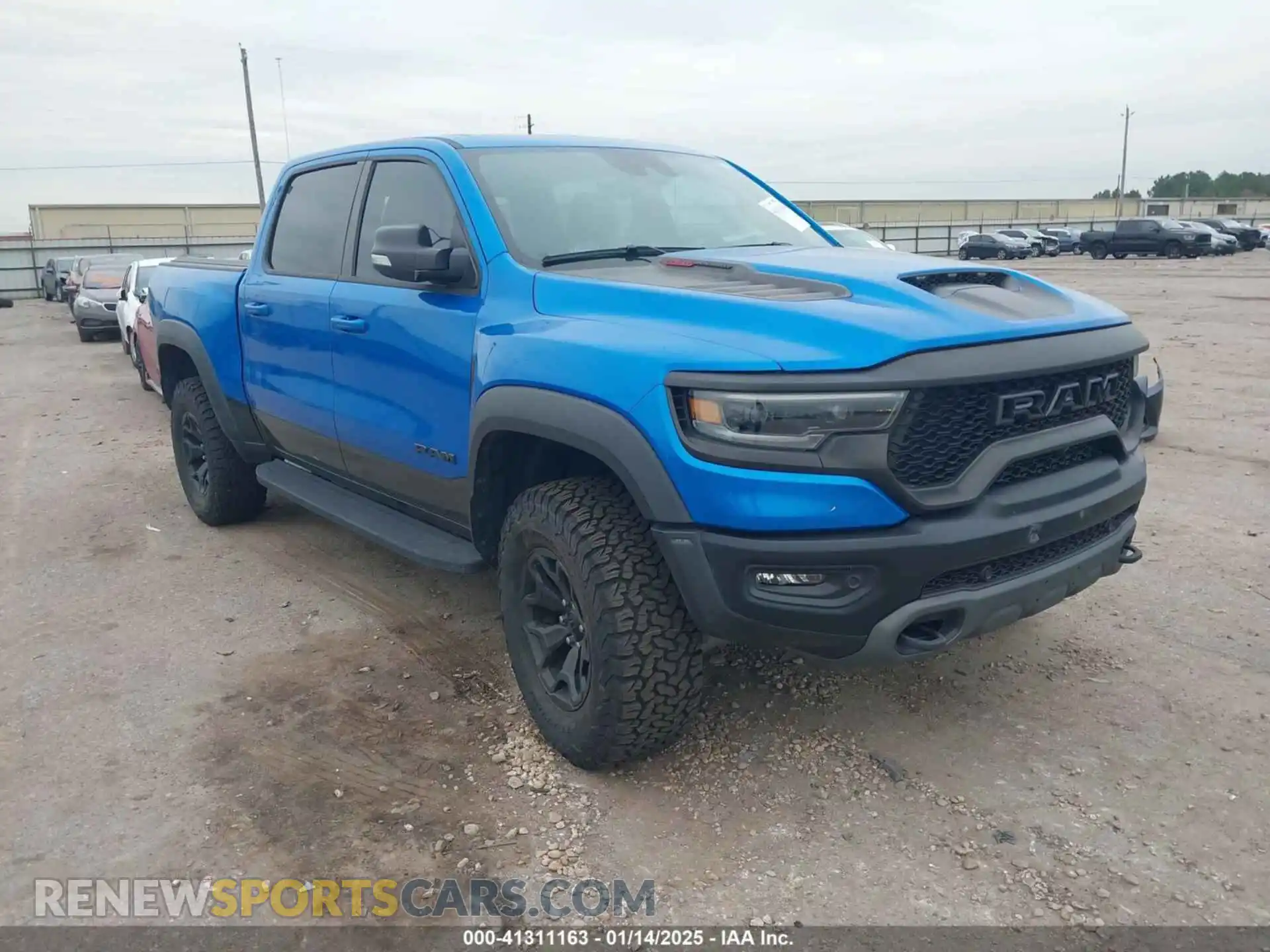 1 Photograph of a damaged car 1C6SRFU91MN685295 RAM 1500 2021