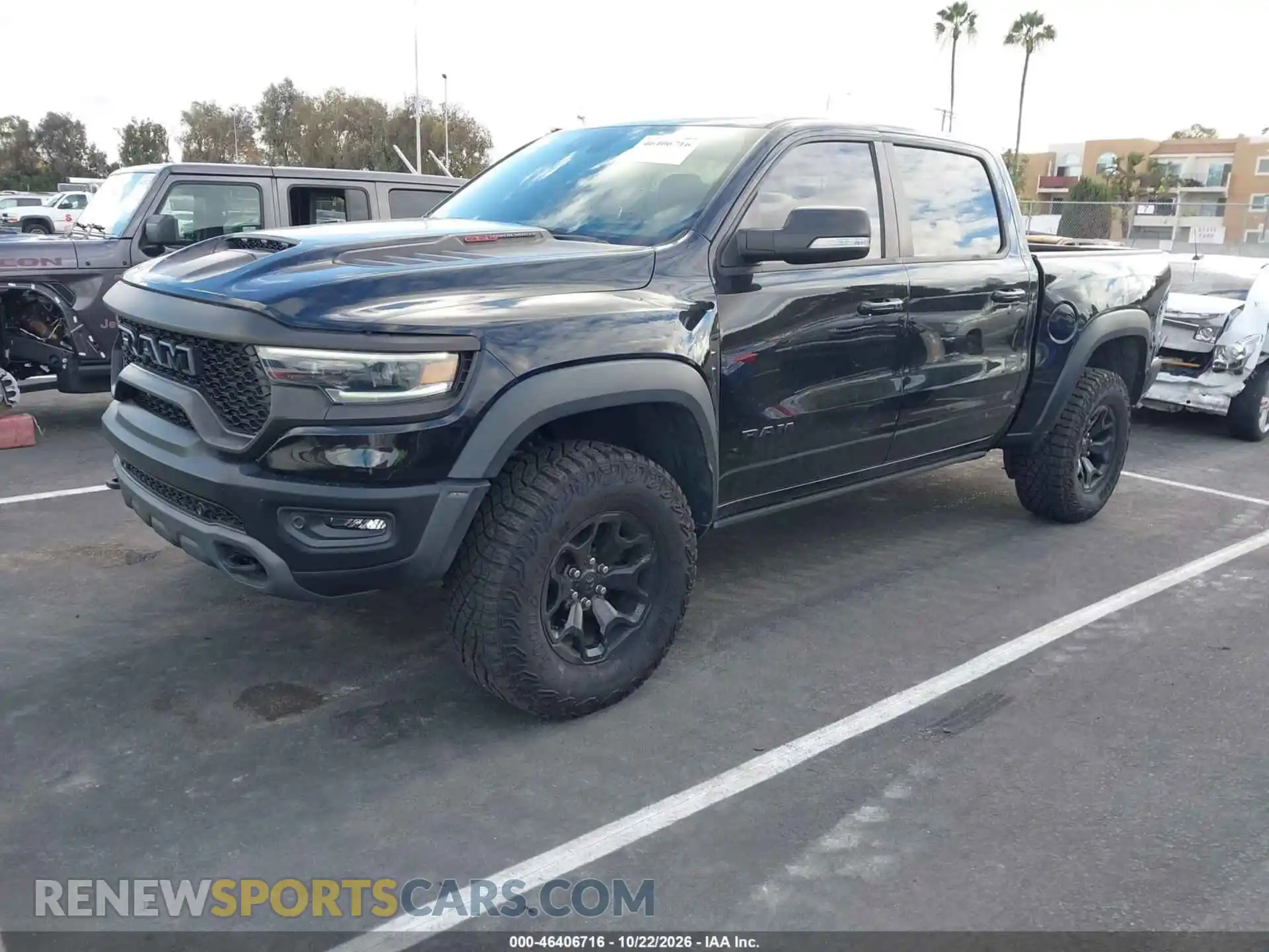 2 Photograph of a damaged car 1C6SRFU91MN764546 RAM 1500 2021