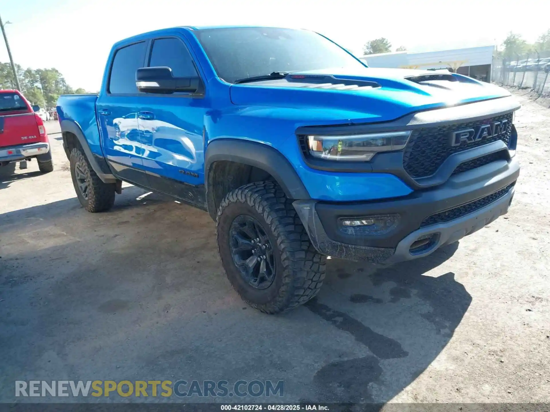 1 Photograph of a damaged car 1C6SRFU91MN900450 RAM 1500 2021