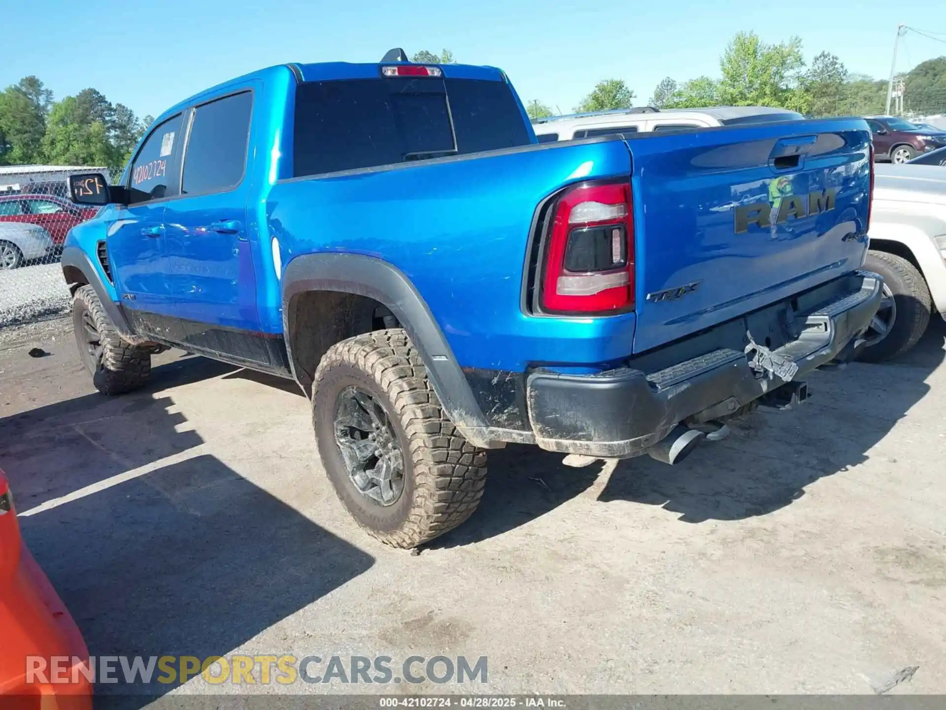 3 Photograph of a damaged car 1C6SRFU91MN900450 RAM 1500 2021