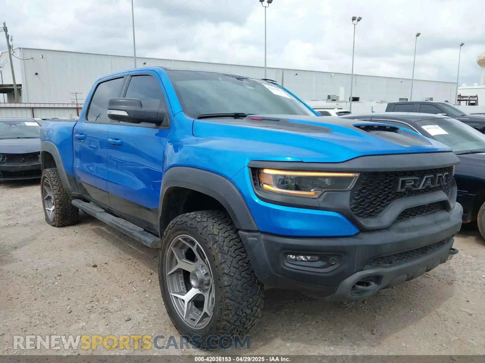 1 Photograph of a damaged car 1C6SRFU91MN903851 RAM 1500 2021