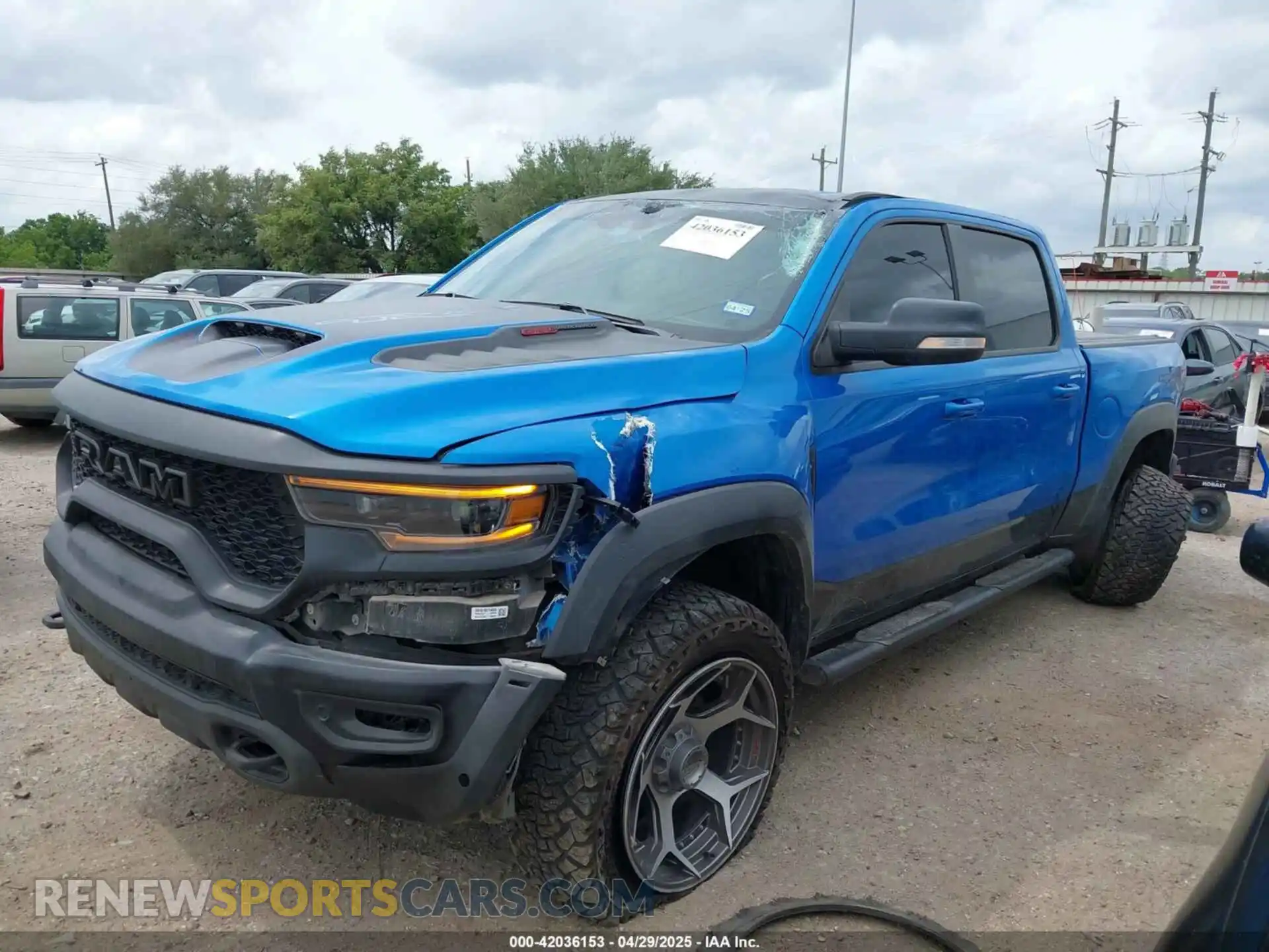 2 Photograph of a damaged car 1C6SRFU91MN903851 RAM 1500 2021