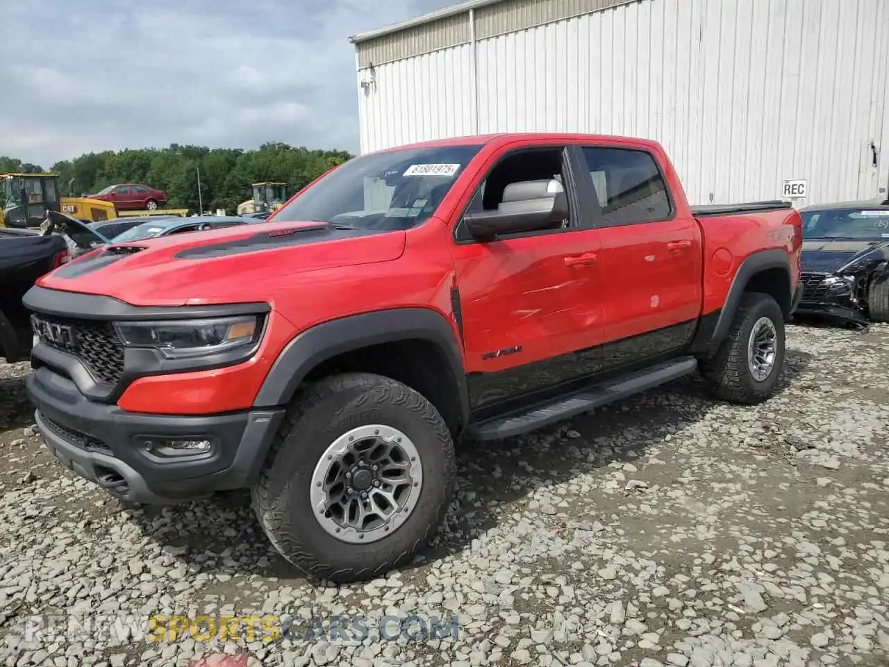 1 Photograph of a damaged car 1C6SRFU92MN684754 RAM 1500 2021