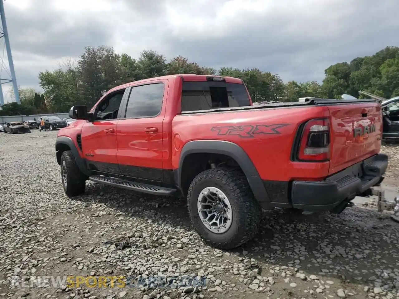 2 Photograph of a damaged car 1C6SRFU92MN684754 RAM 1500 2021