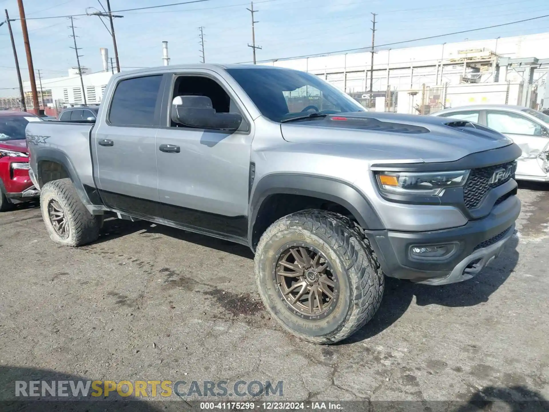 1 Photograph of a damaged car 1C6SRFU92MN726050 RAM 1500 2021