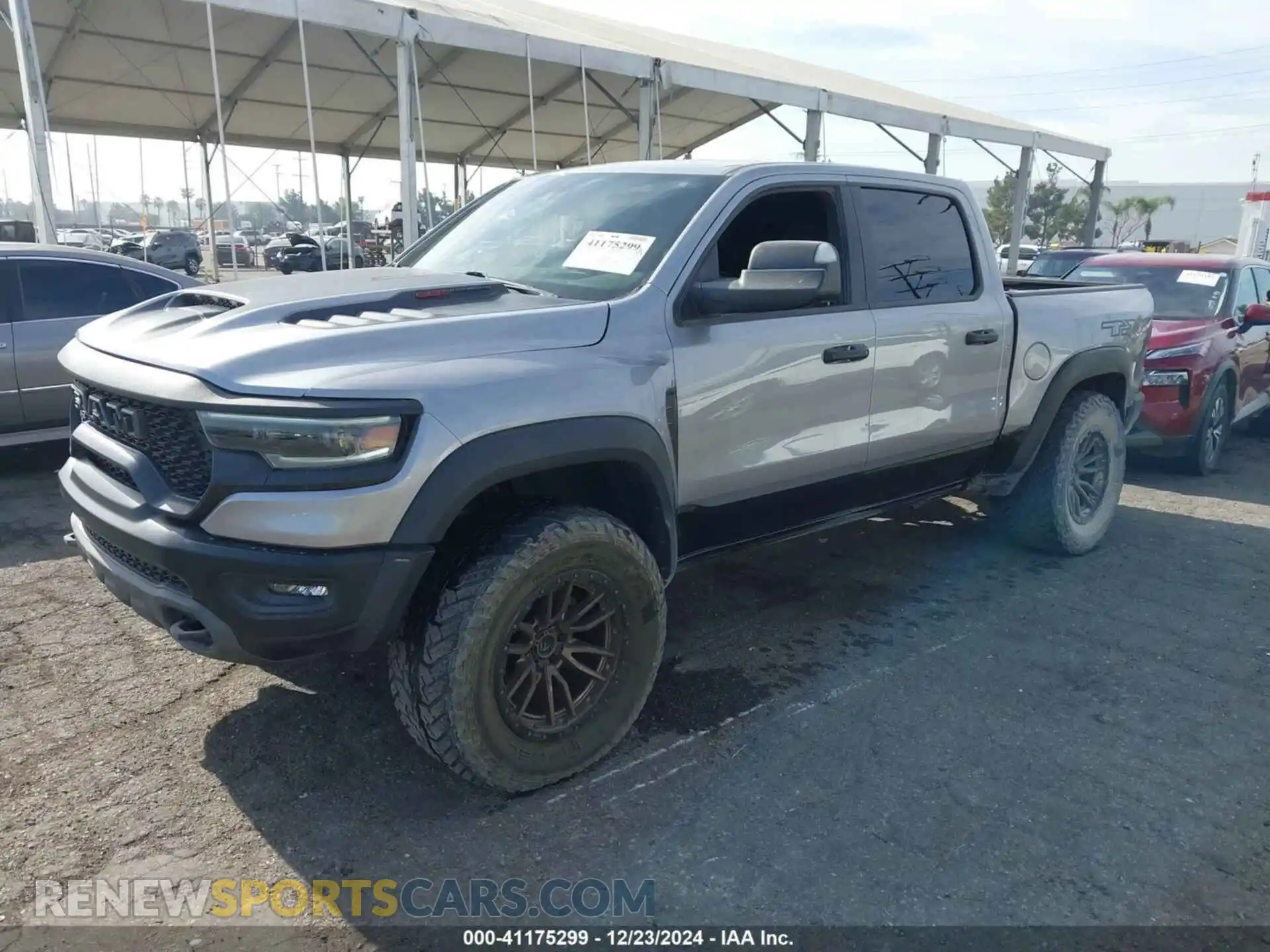 2 Photograph of a damaged car 1C6SRFU92MN726050 RAM 1500 2021