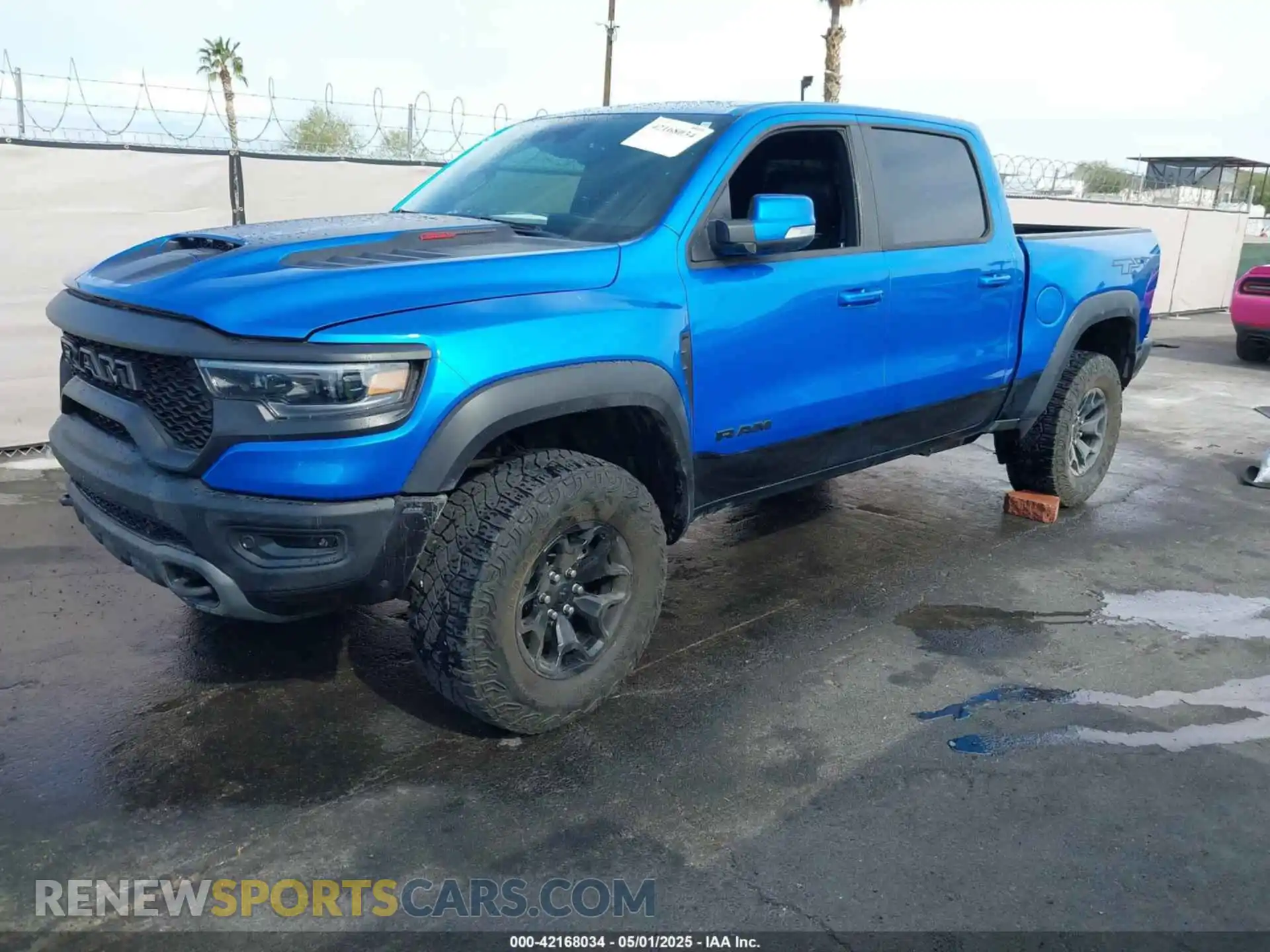 2 Photograph of a damaged car 1C6SRFU94MN705006 RAM 1500 2021