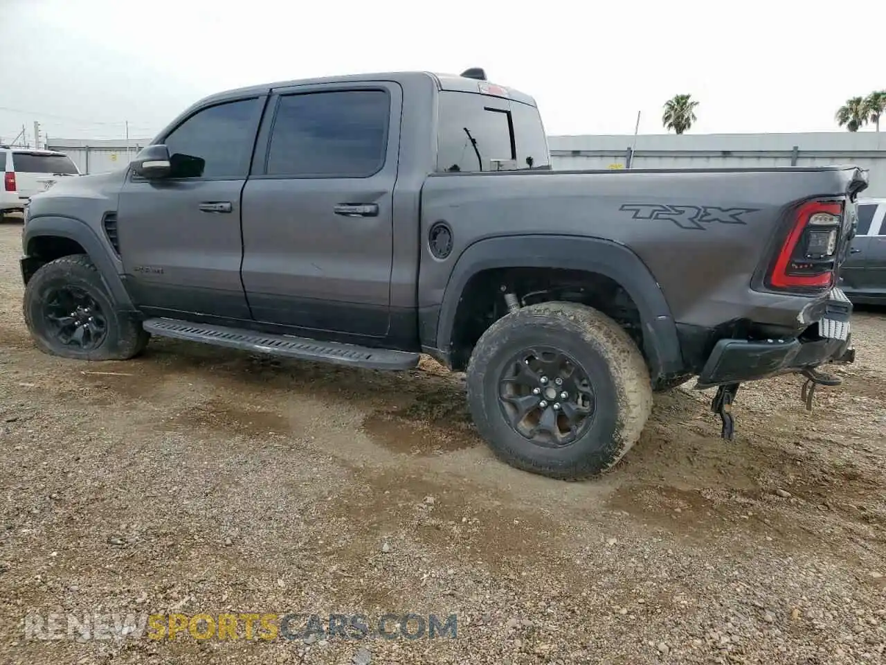 2 Photograph of a damaged car 1C6SRFU94MN767411 RAM 1500 2021