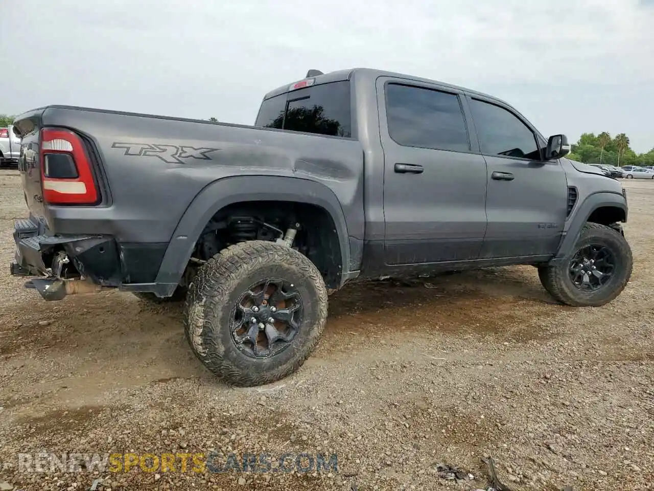 3 Photograph of a damaged car 1C6SRFU94MN767411 RAM 1500 2021