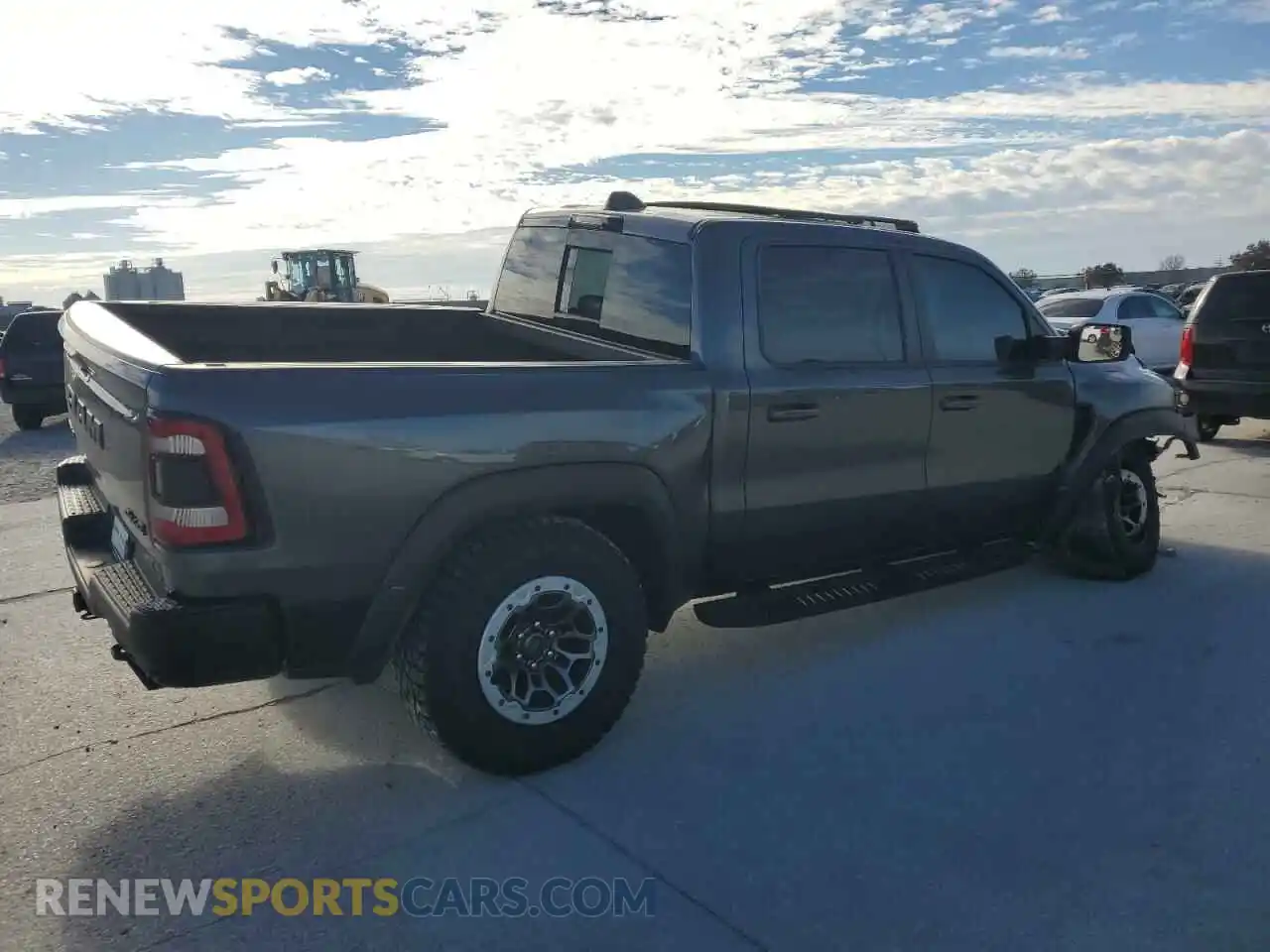 3 Photograph of a damaged car 1C6SRFU94MN829552 RAM 1500 2021