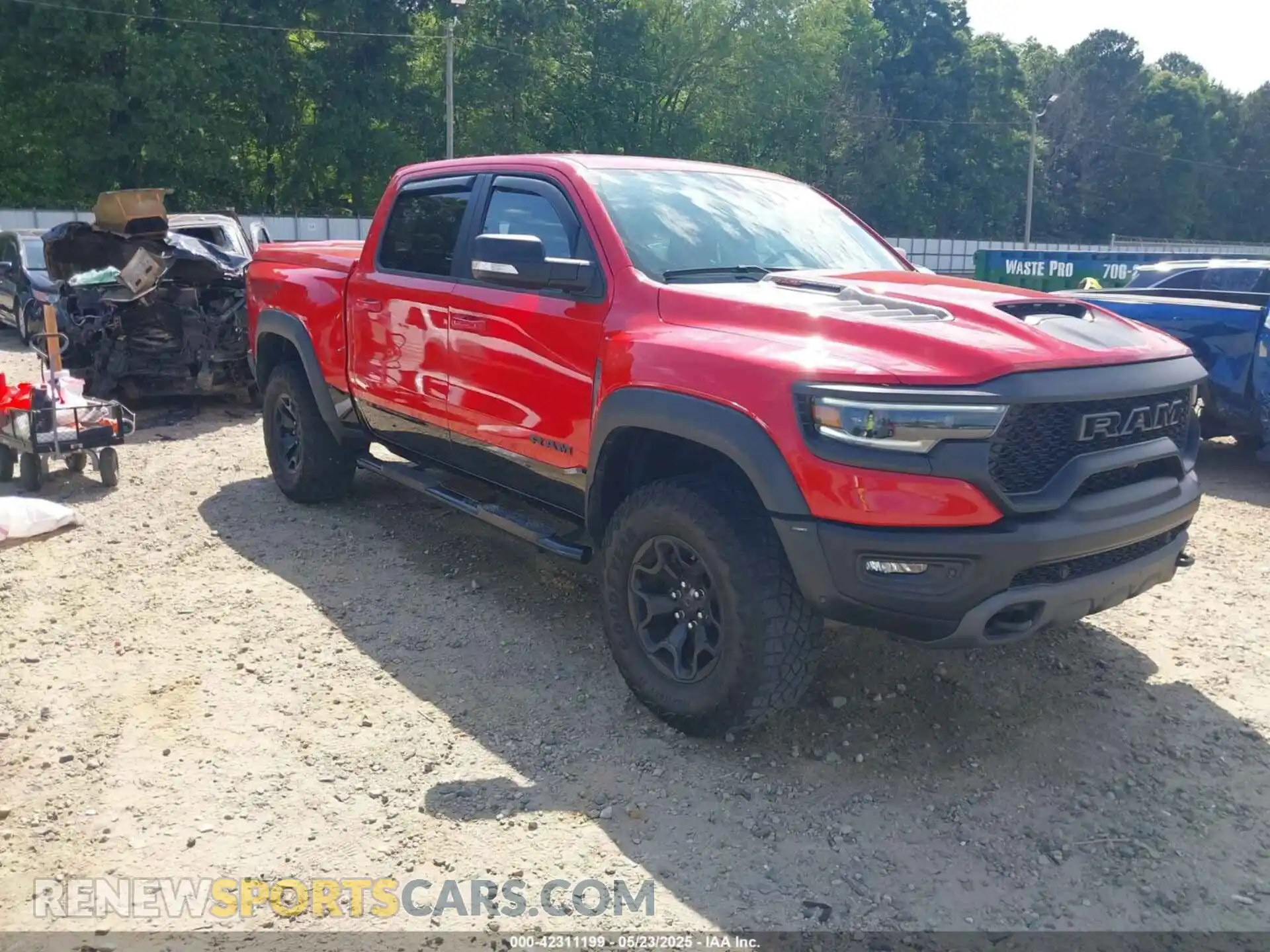 1 Photograph of a damaged car 1C6SRFU94MN903505 RAM 1500 2021
