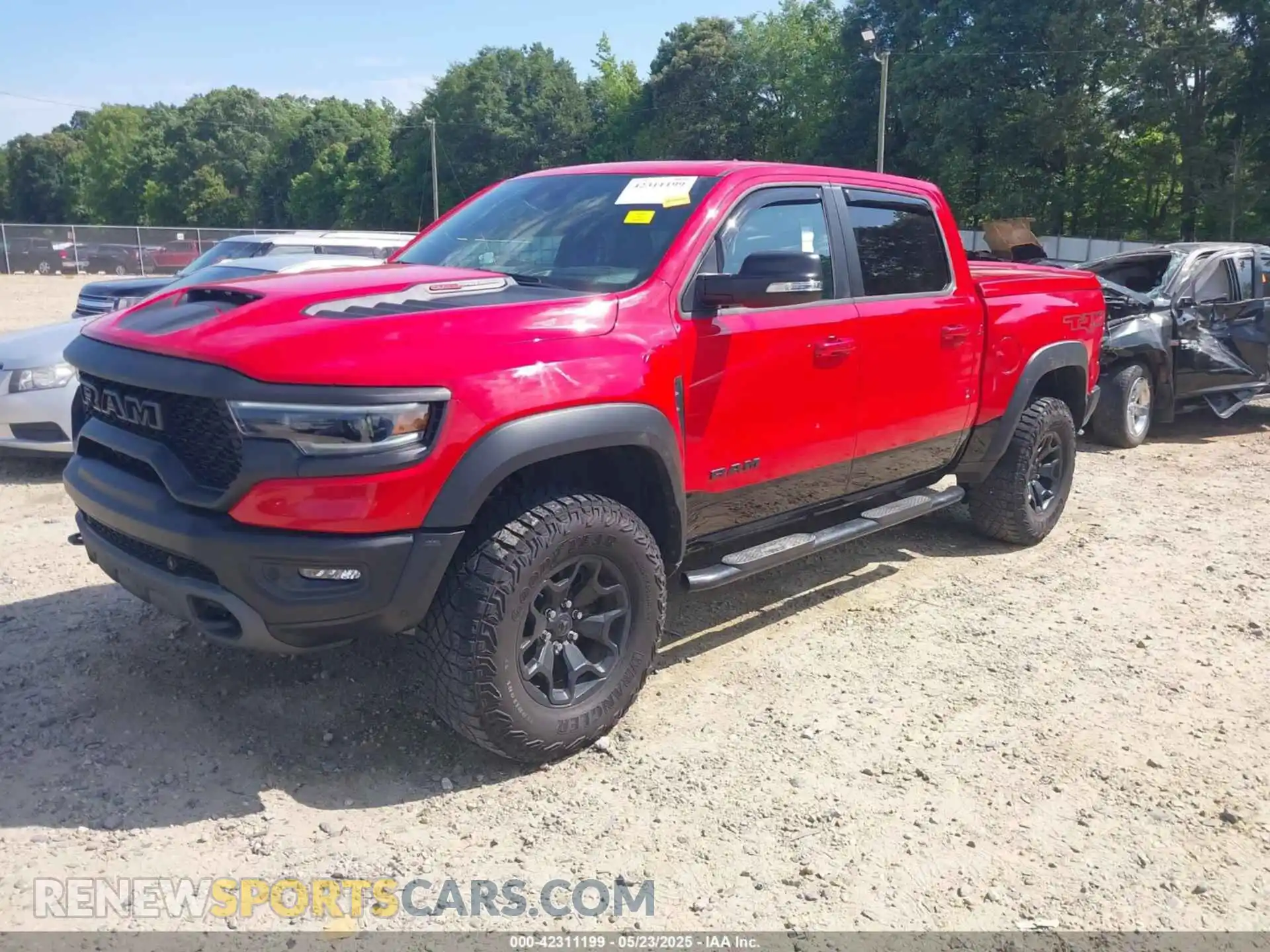 2 Photograph of a damaged car 1C6SRFU94MN903505 RAM 1500 2021