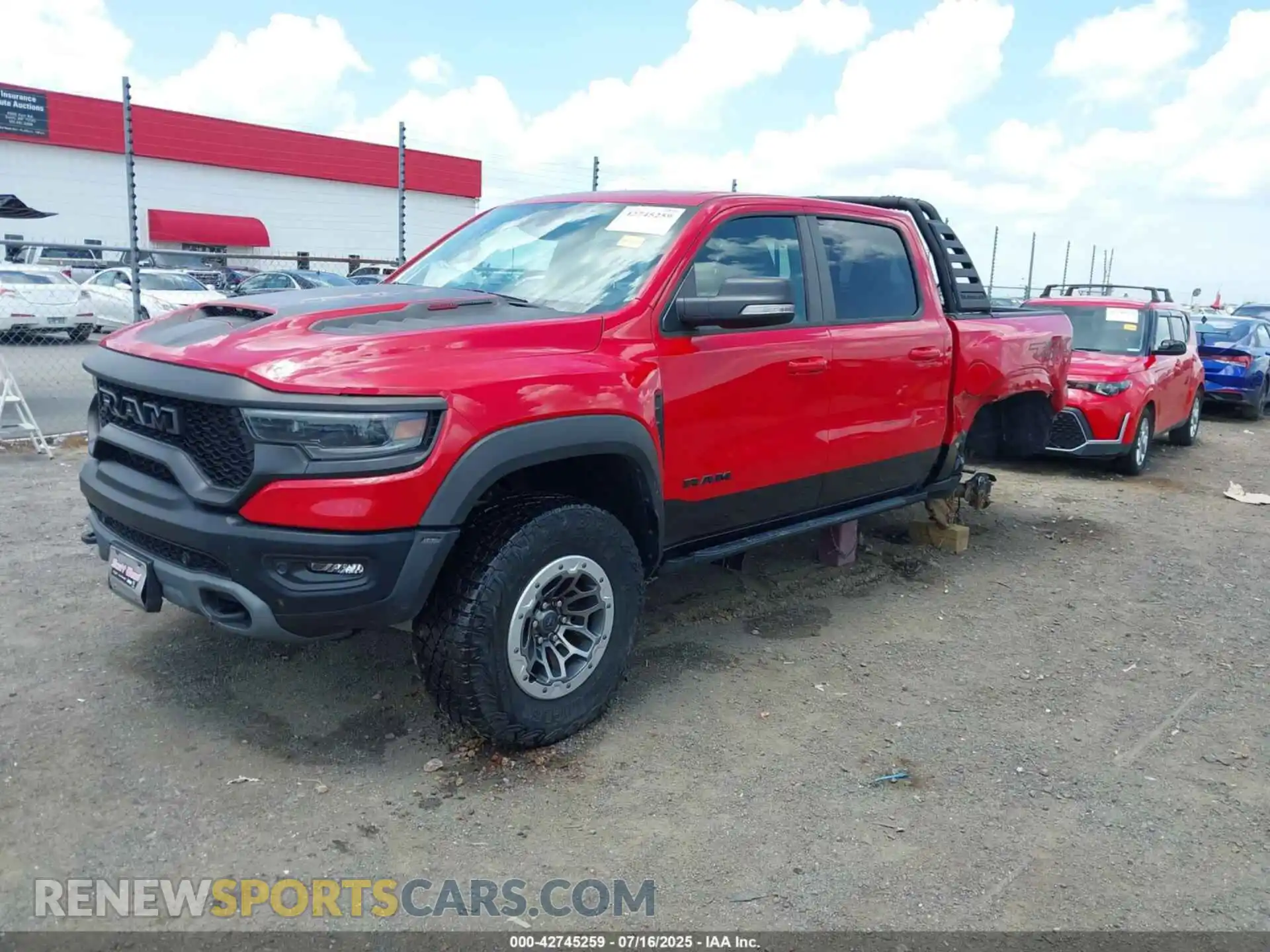 2 Photograph of a damaged car 1C6SRFU95MN685249 RAM 1500 2021