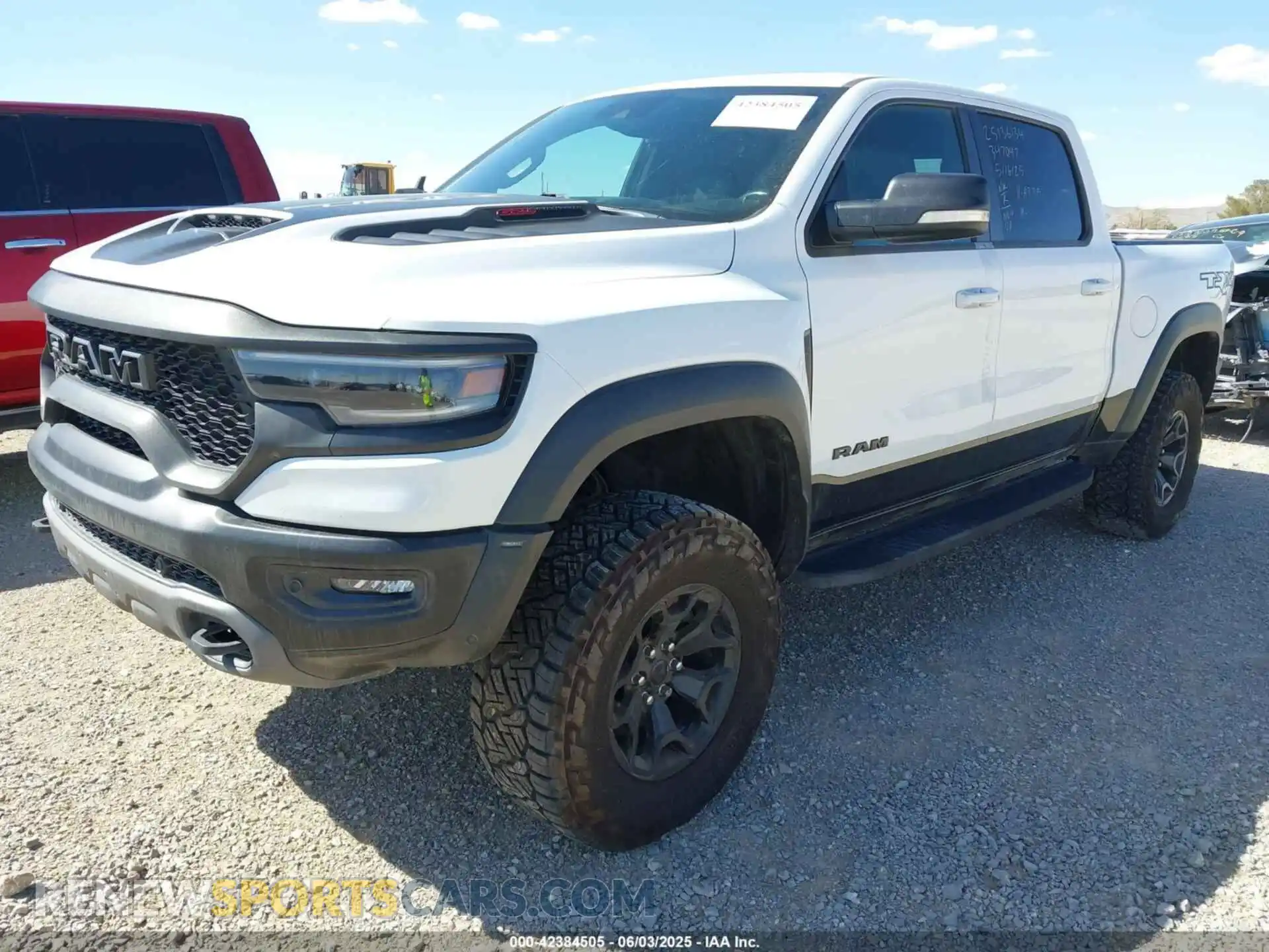 2 Photograph of a damaged car 1C6SRFU95MN736992 RAM 1500 2021