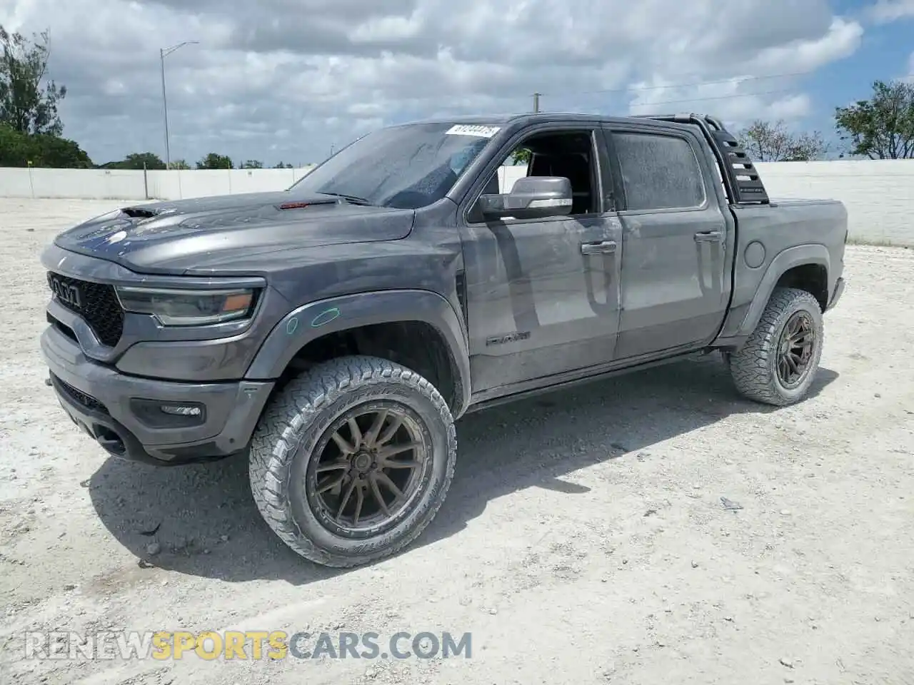 1 Photograph of a damaged car 1C6SRFU95MN804496 RAM 1500 2021