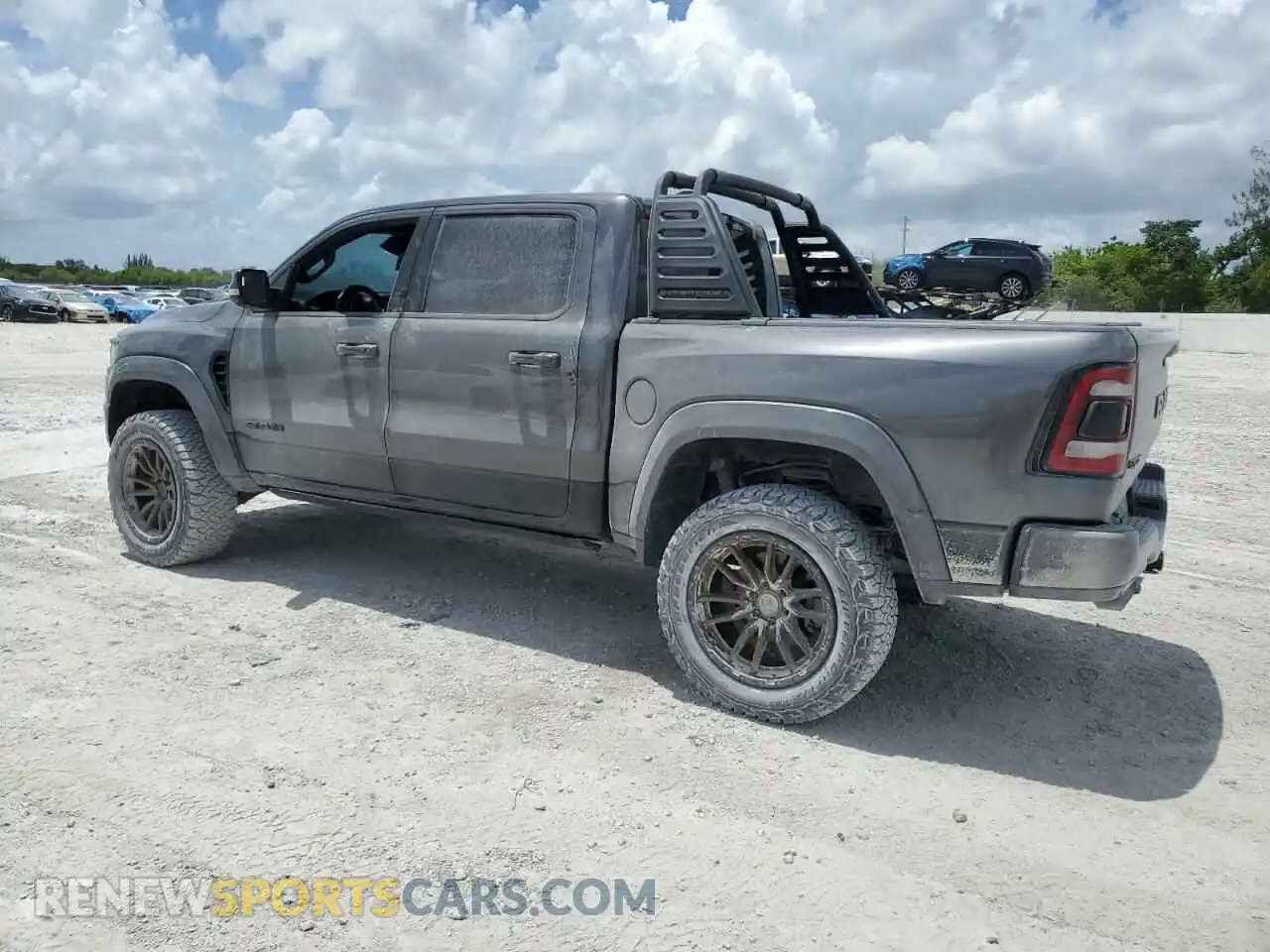 2 Photograph of a damaged car 1C6SRFU95MN804496 RAM 1500 2021