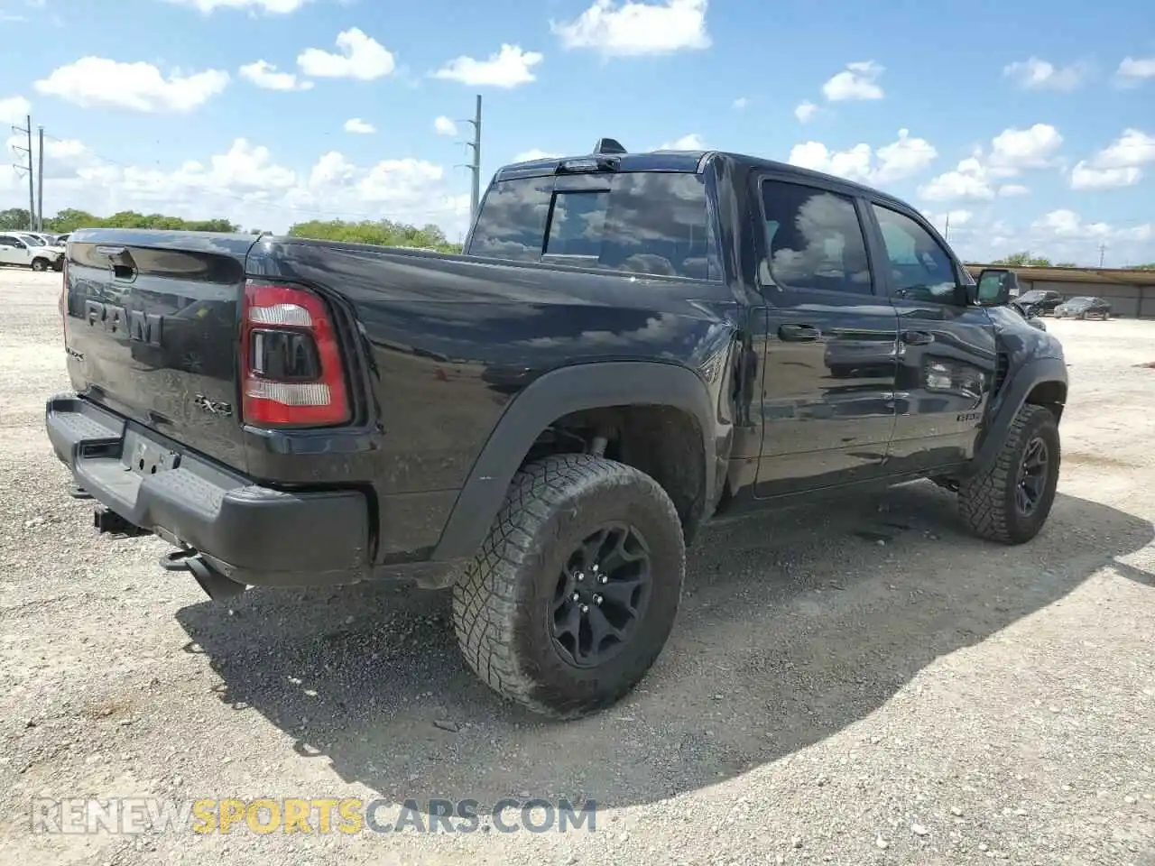 3 Photograph of a damaged car 1C6SRFU96MN685390 RAM 1500 2021