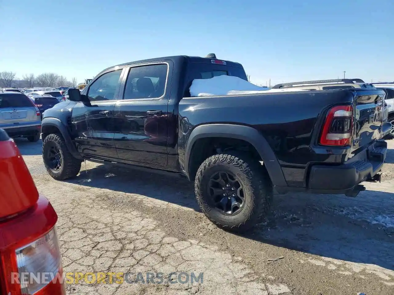 2 Photograph of a damaged car 1C6SRFU96MN781696 RAM 1500 2021